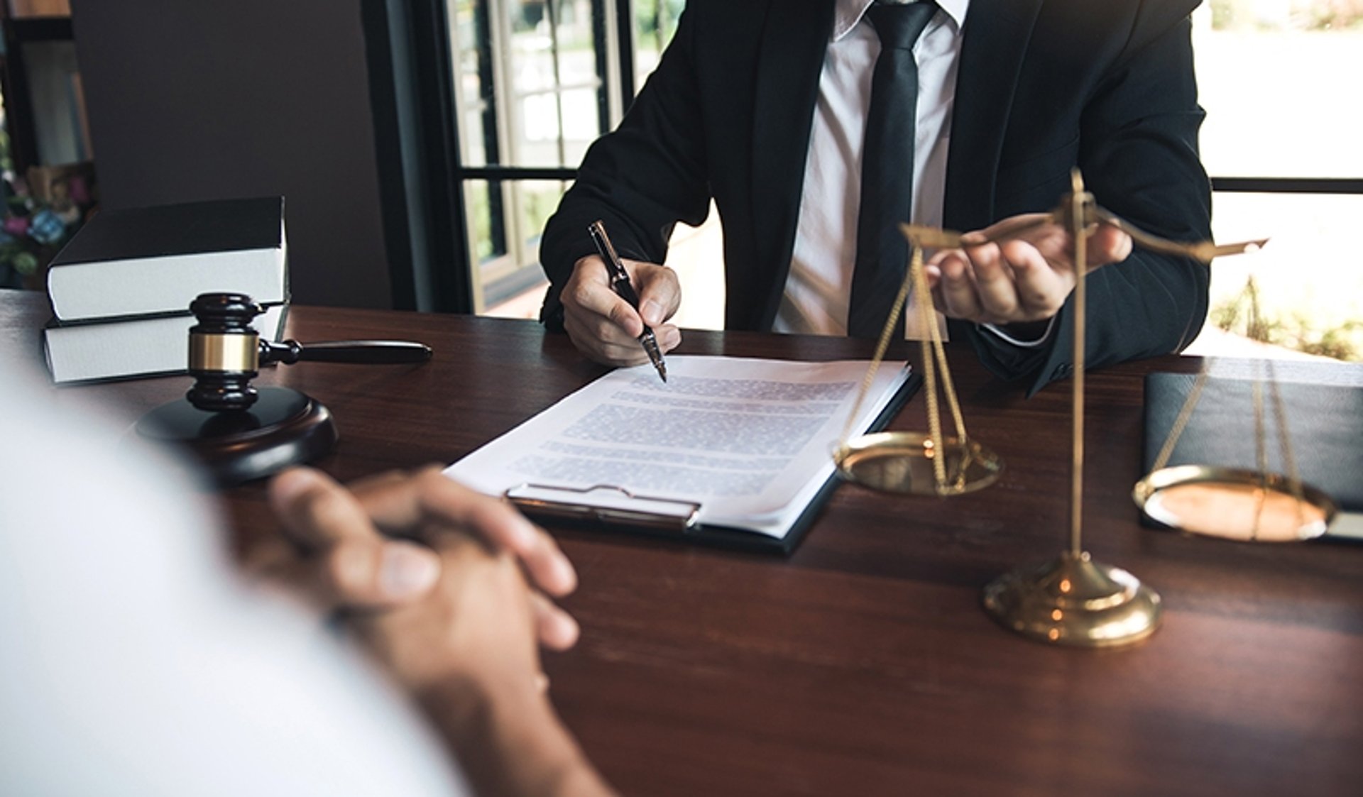 a close up of a black and brown abstract painting