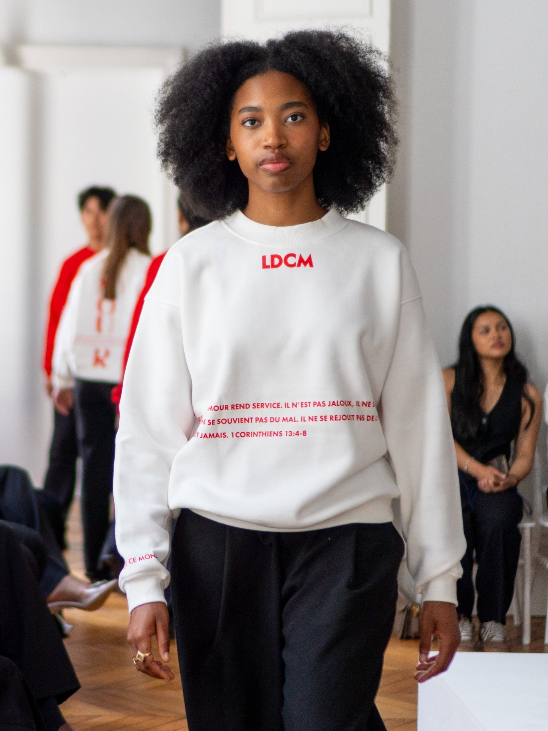 an abstract photo of a curved building with a blue sky in the background