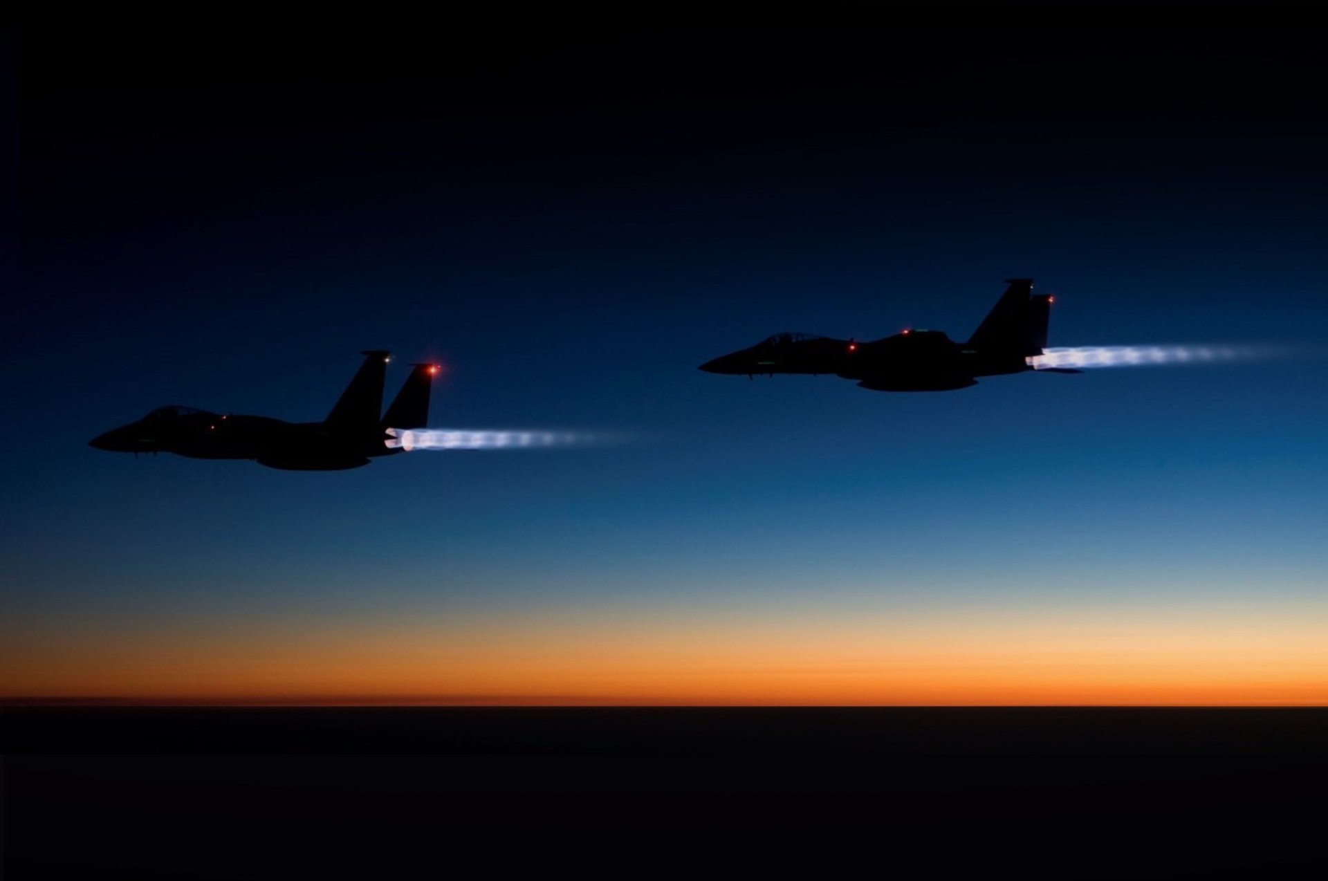 black and white table lamp on brown wooden table