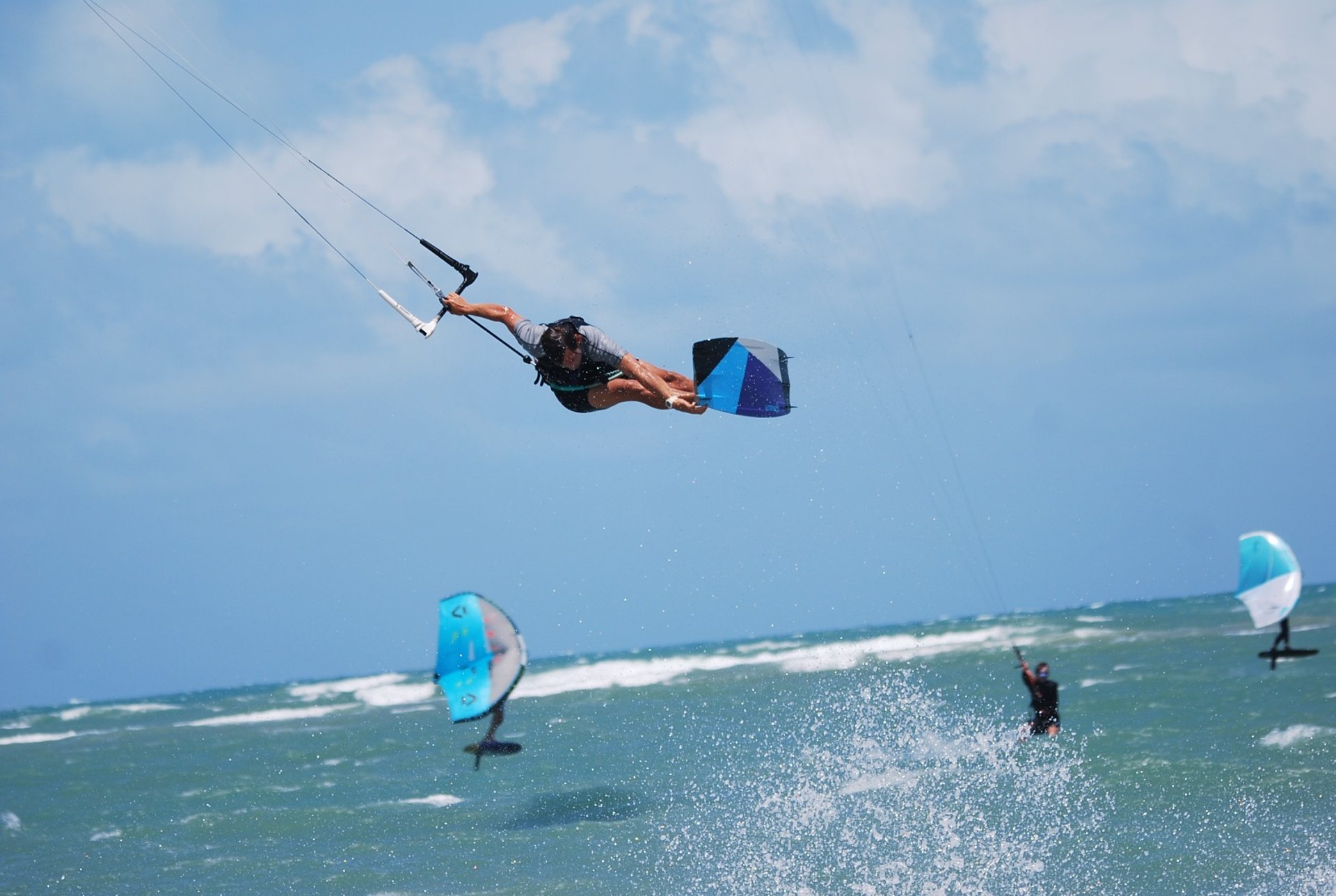 black and brown leather padded tub sofa