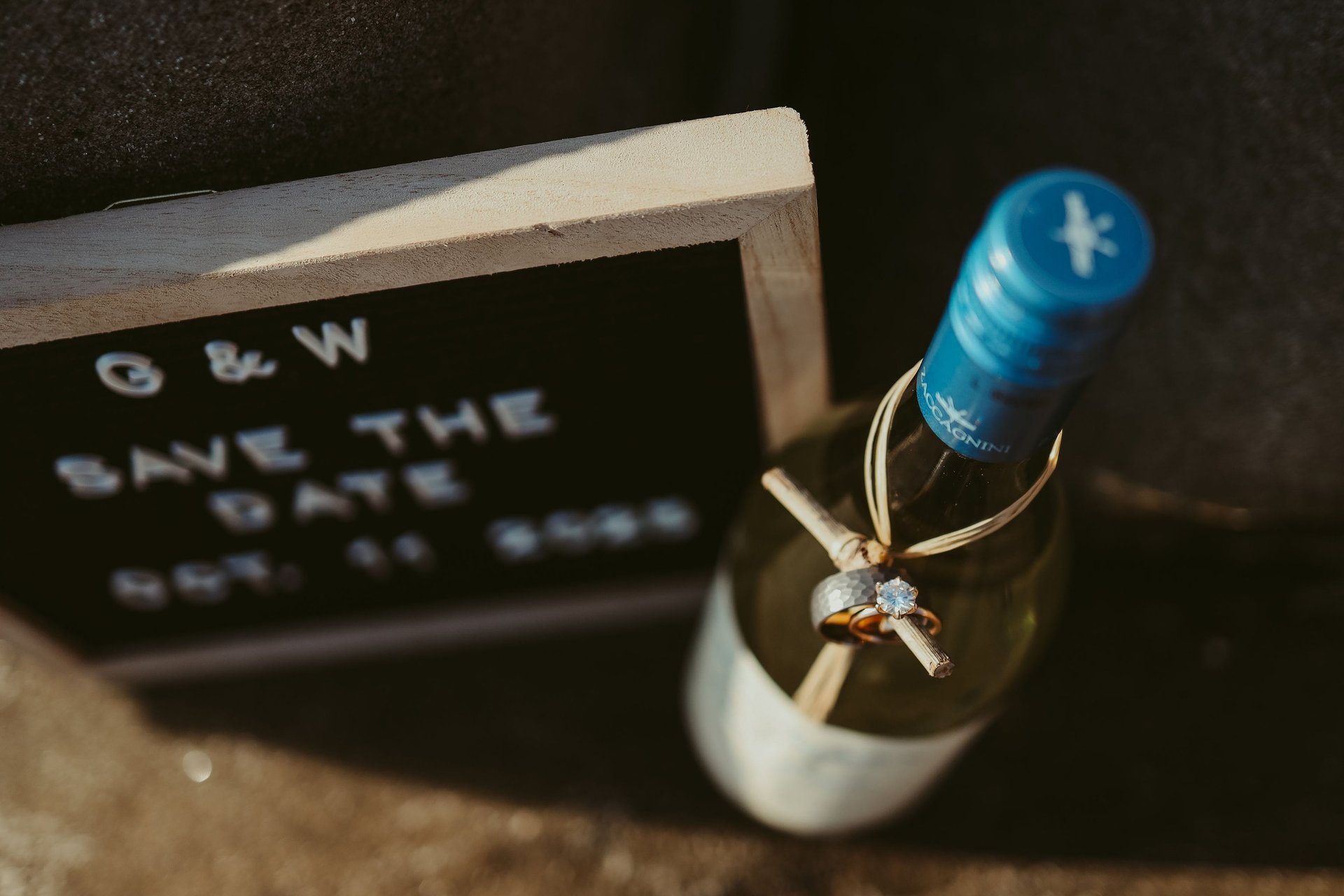 two person holding hands on white flower