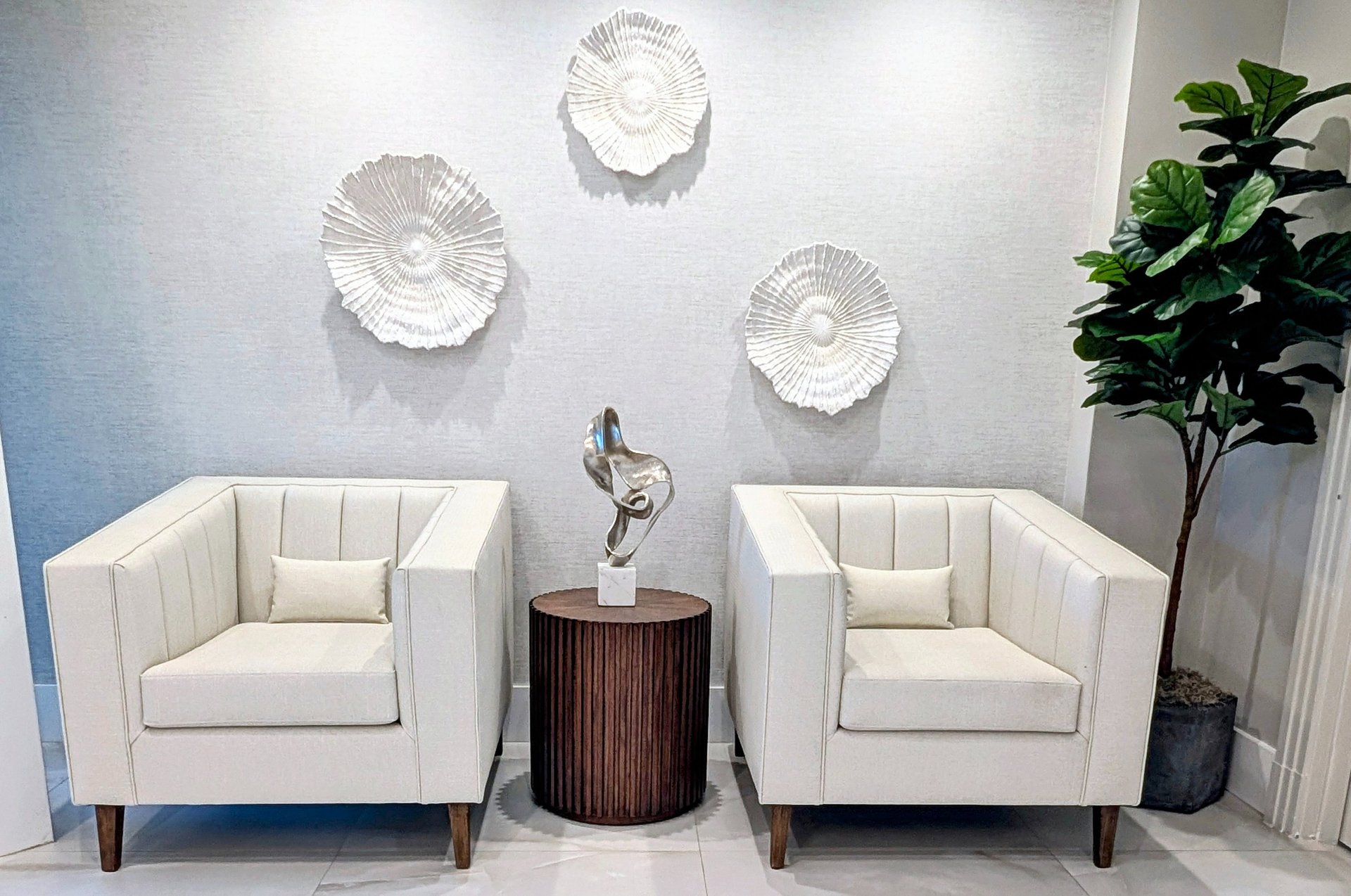 an abstract photo of a curved building with a blue sky in the background