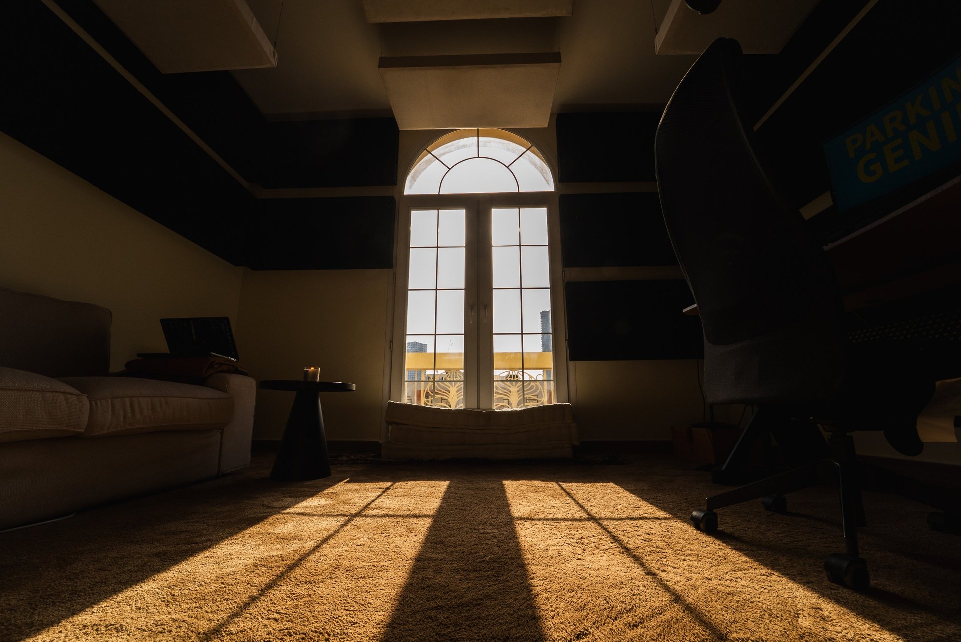 black and brown leather padded tub sofa