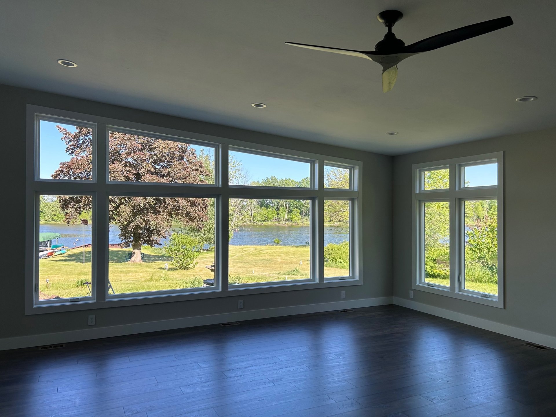 black and brown leather padded tub sofa