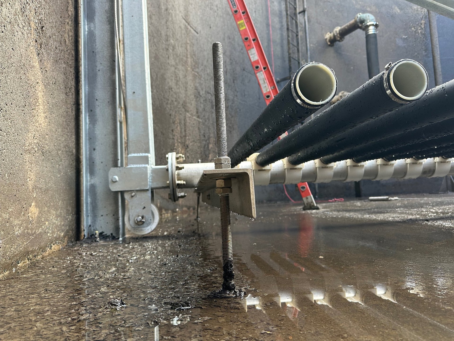 an abstract photo of a curved building with a blue sky in the background