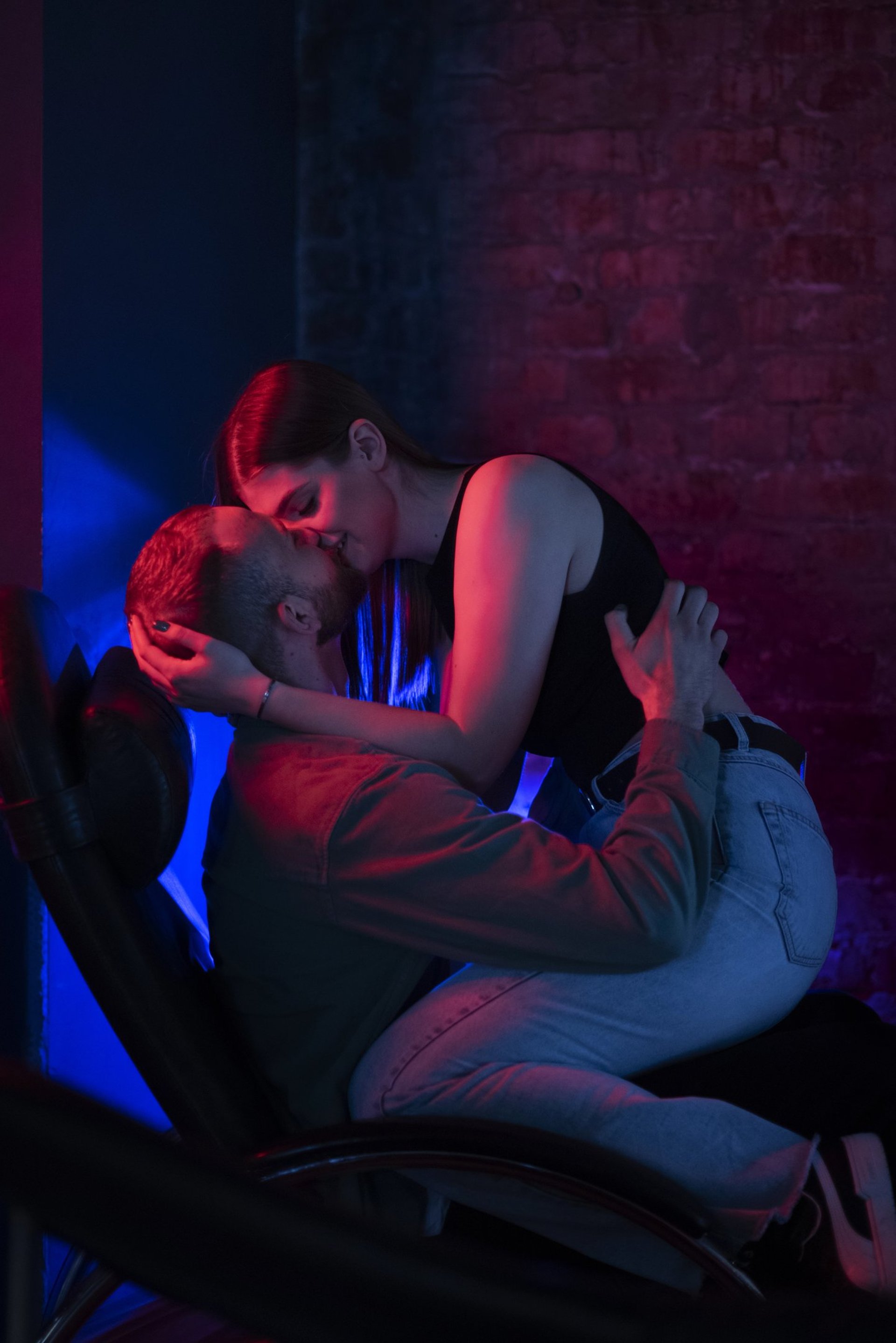 man and woman walking on asphalt road