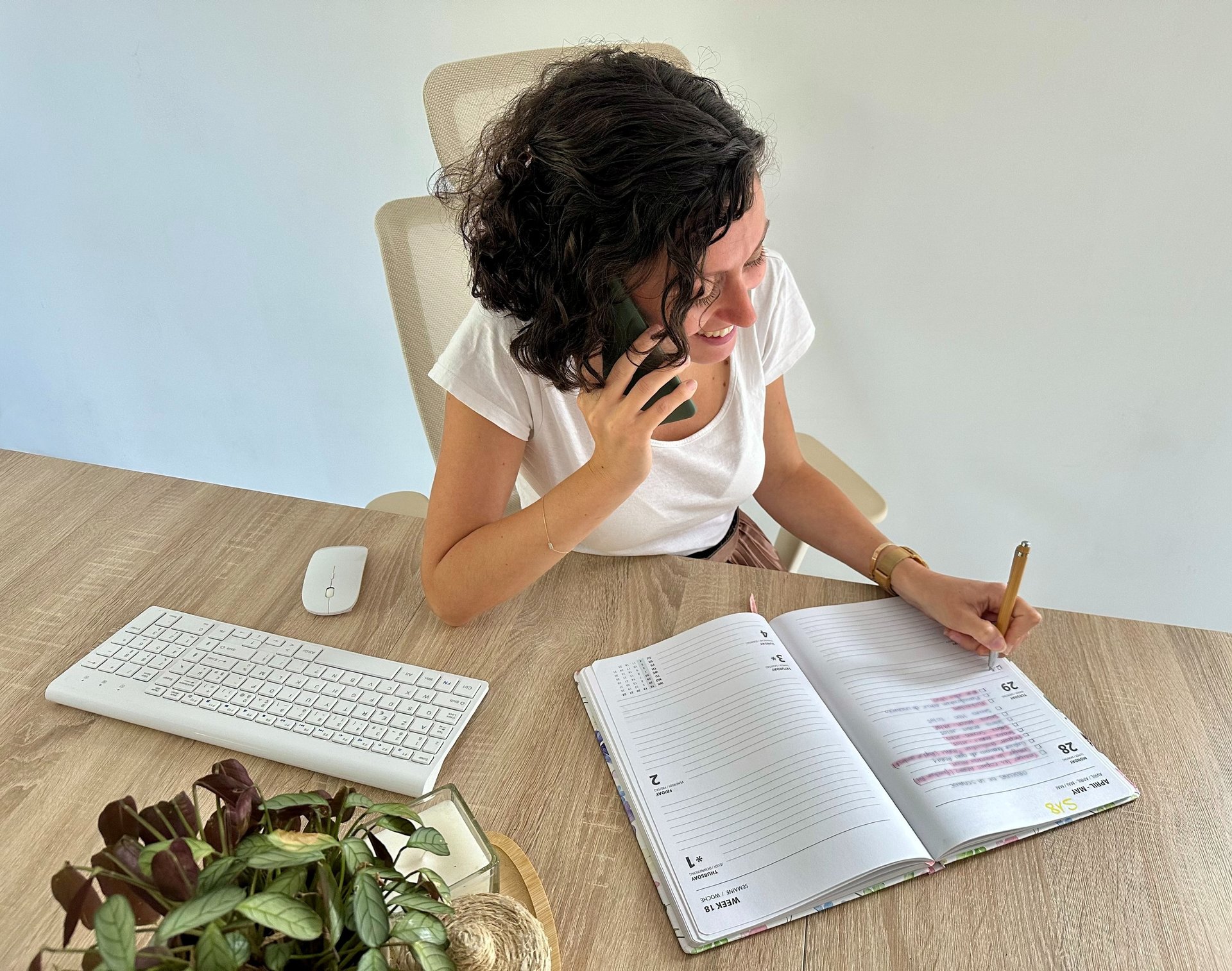 person typing on Apple keyboard