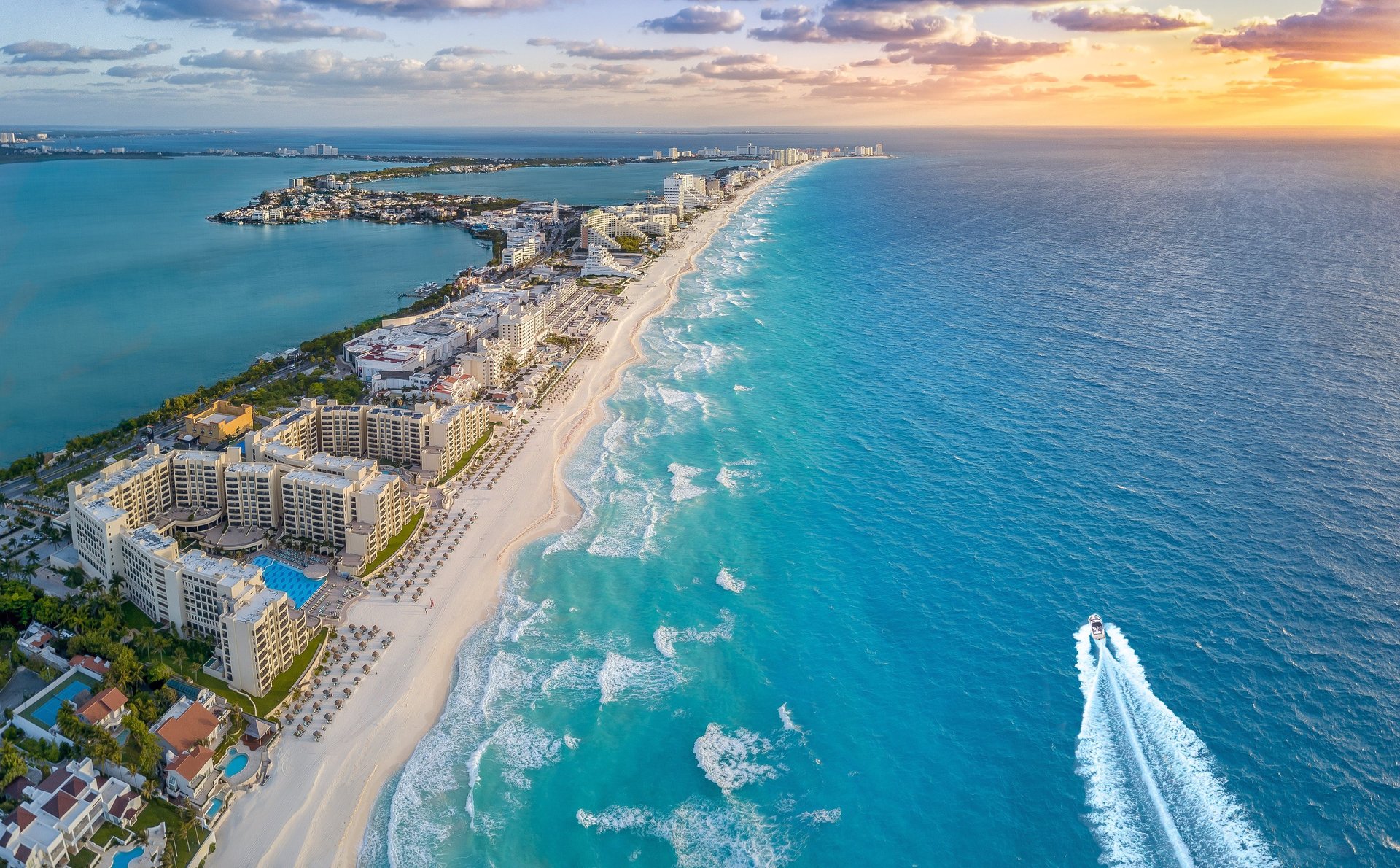 a view of a beach from a cliff