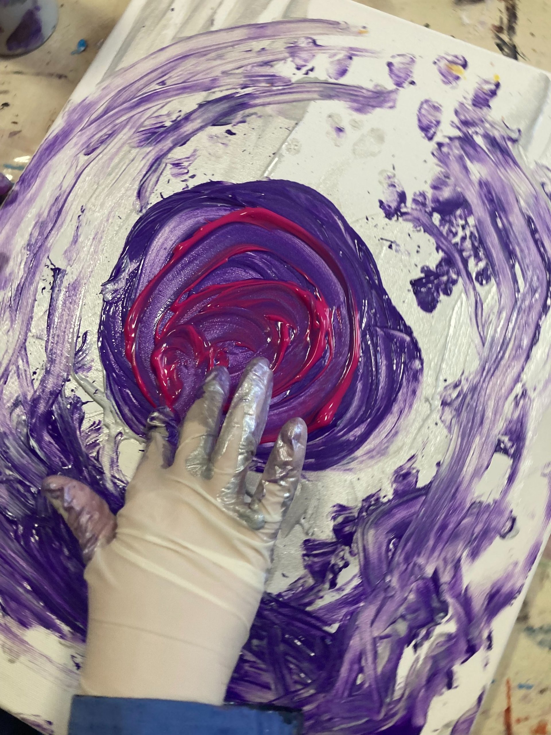an abstract photo of a curved building with a blue sky in the background