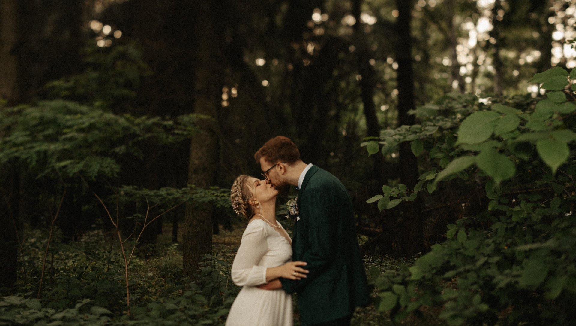 an abstract photo of a curved building with a blue sky in the background