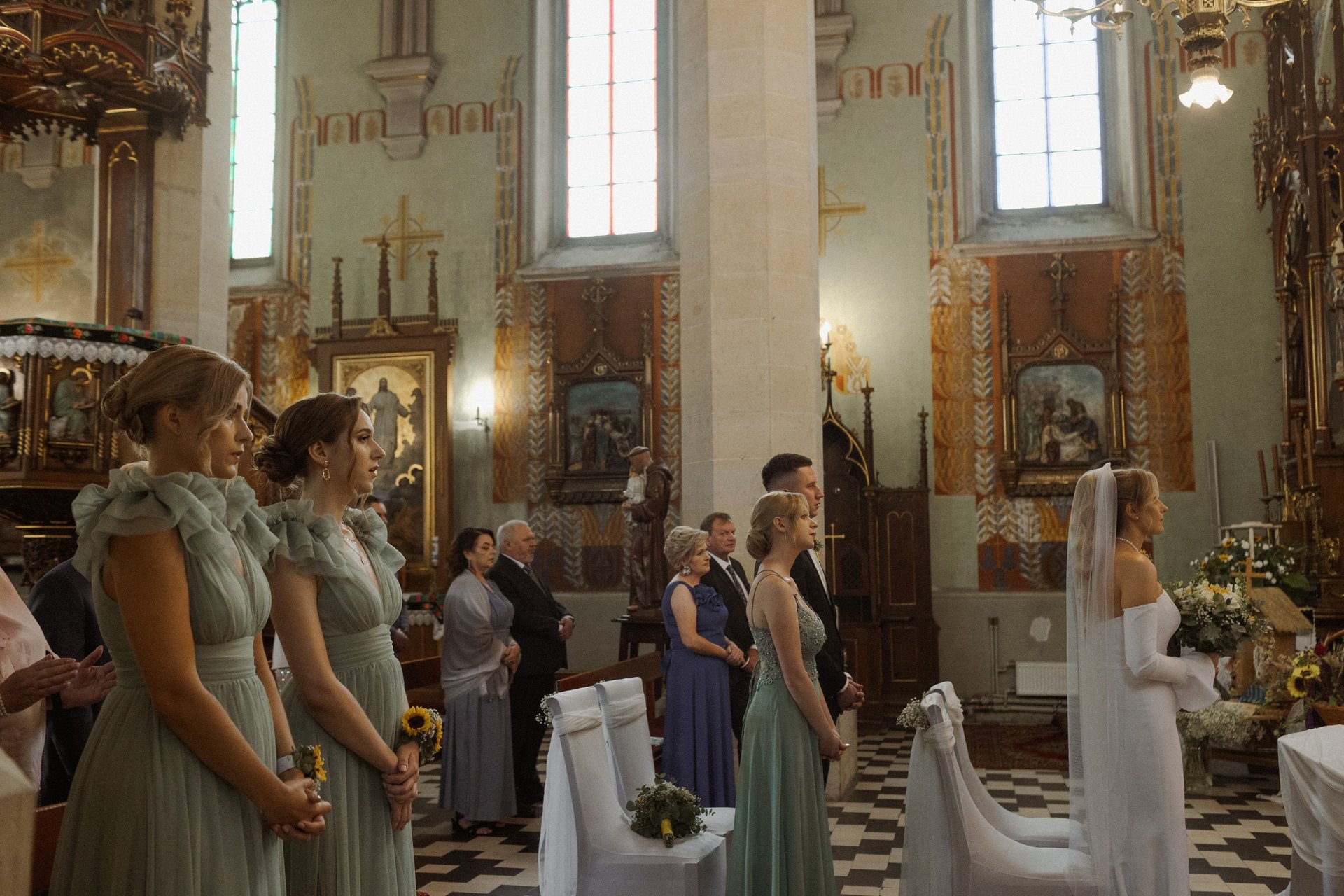 an abstract photo of a curved building with a blue sky in the background