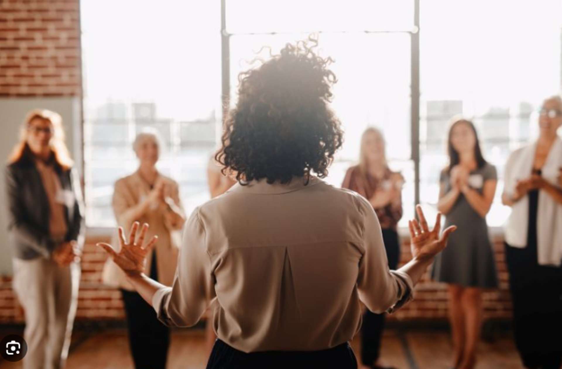 black and brown leather padded tub sofa