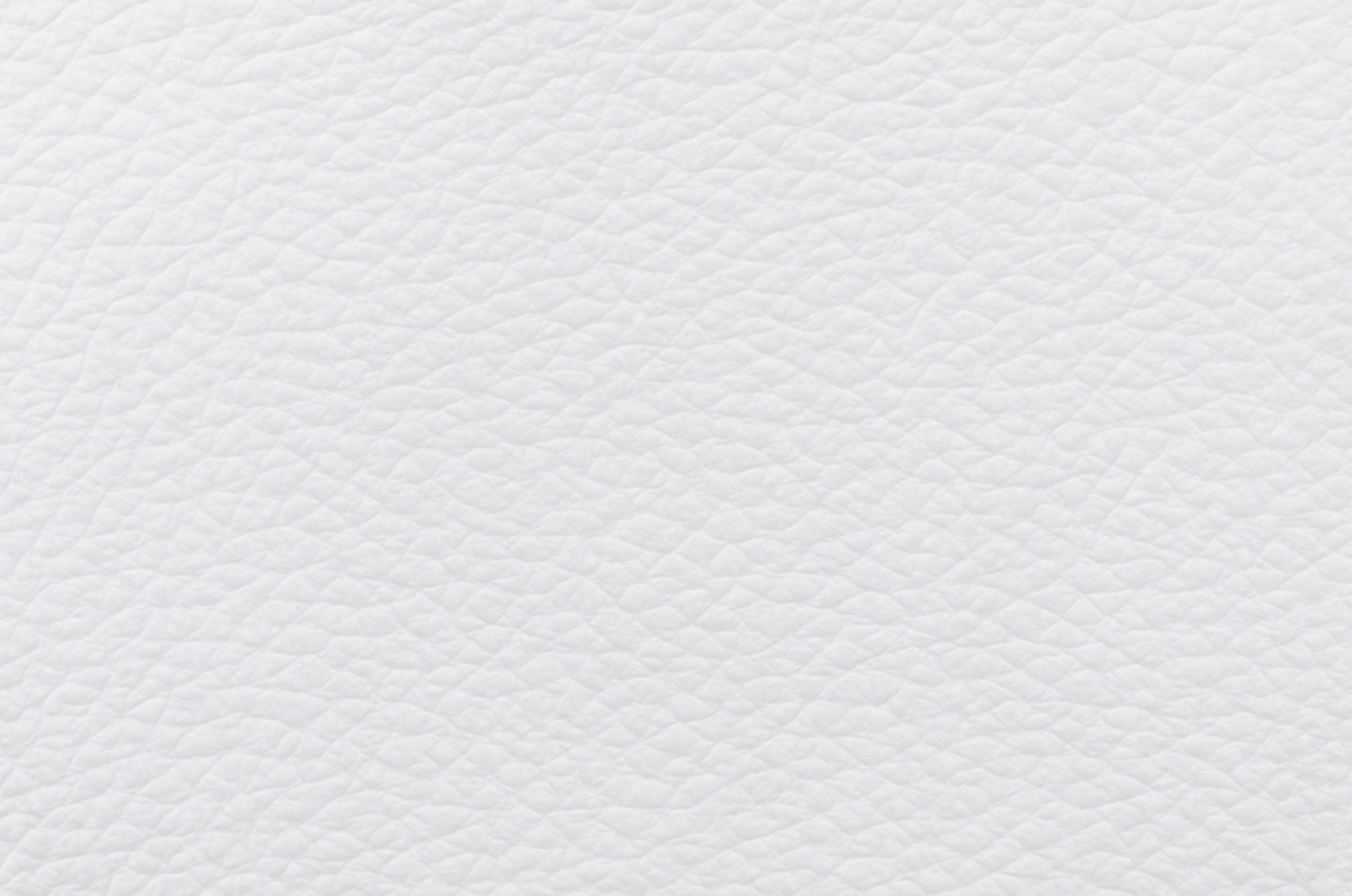 a close up of a white marble surface