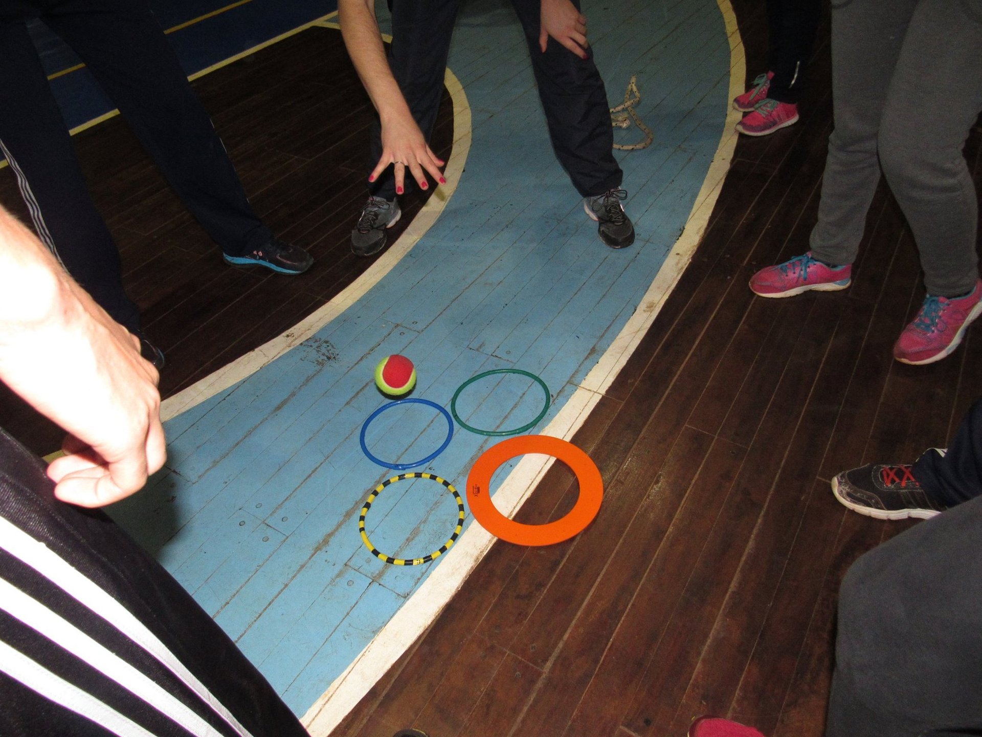 an abstract photo of a curved building with a blue sky in the background