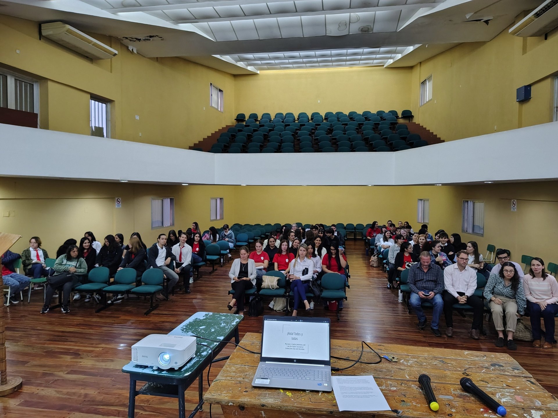 an abstract photo of a curved building with a blue sky in the background