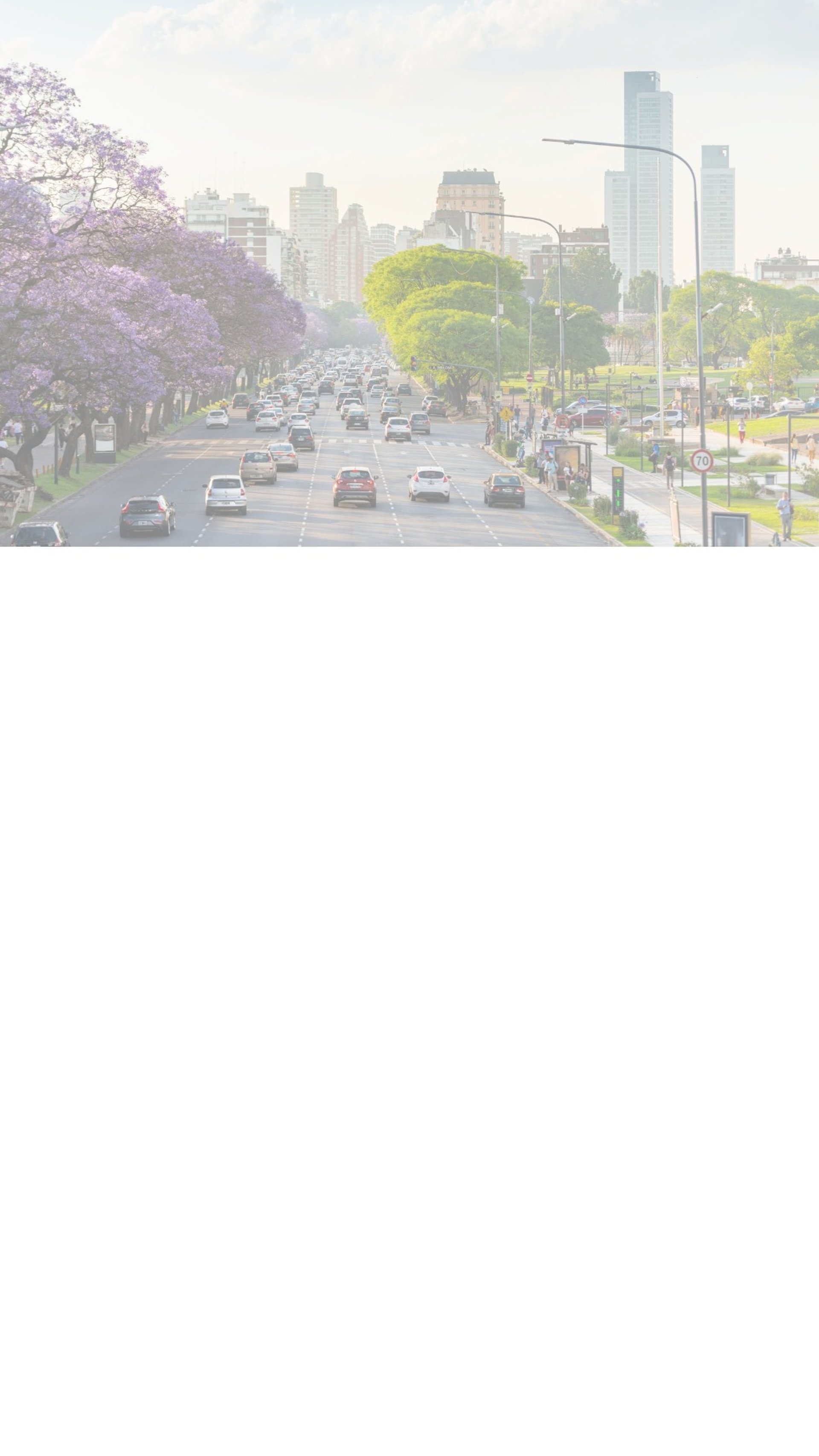 an aerial view of a city with tall buildings