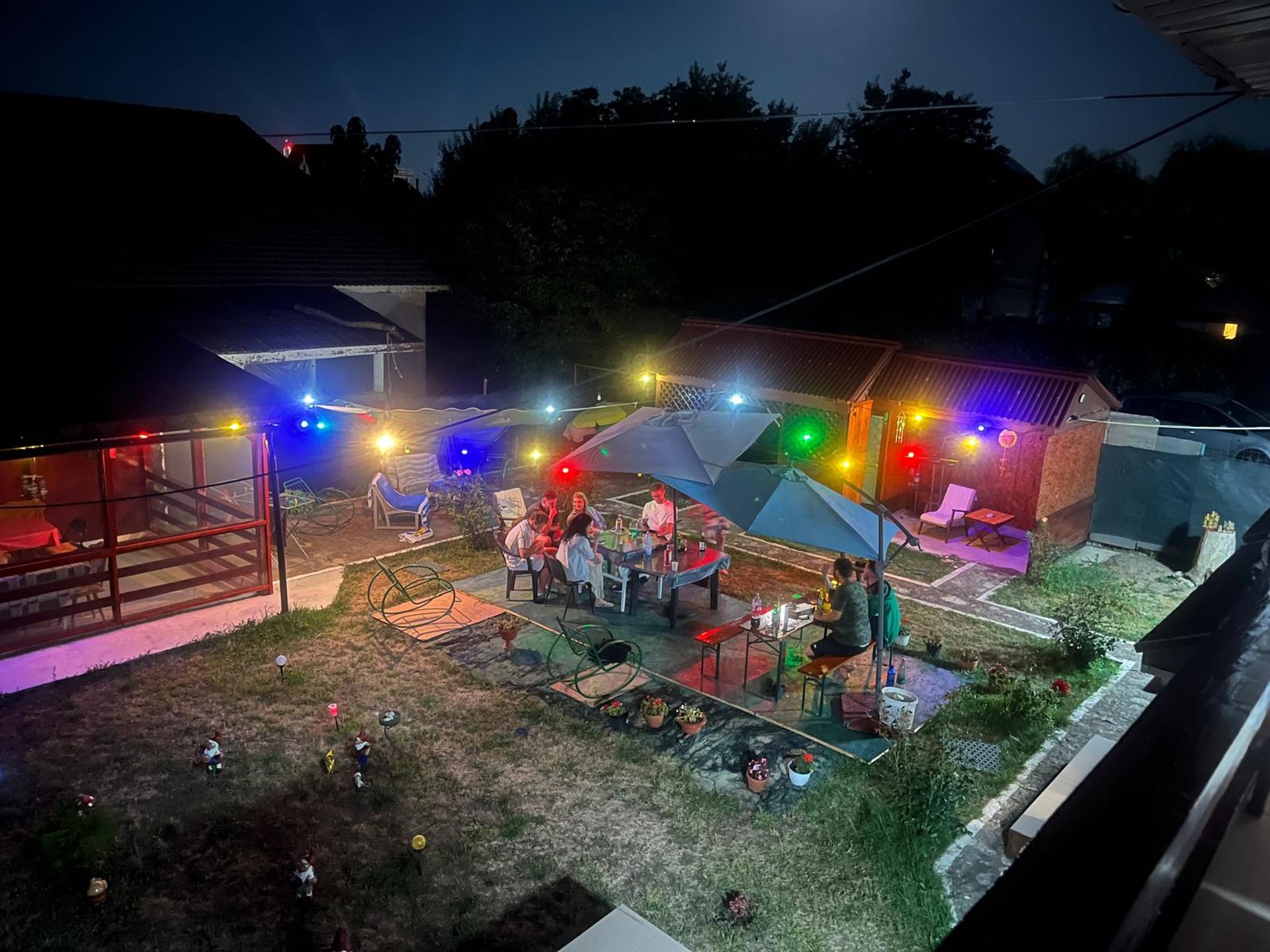 woman wearing yellow long-sleeved dress under white clouds and blue sky during daytime