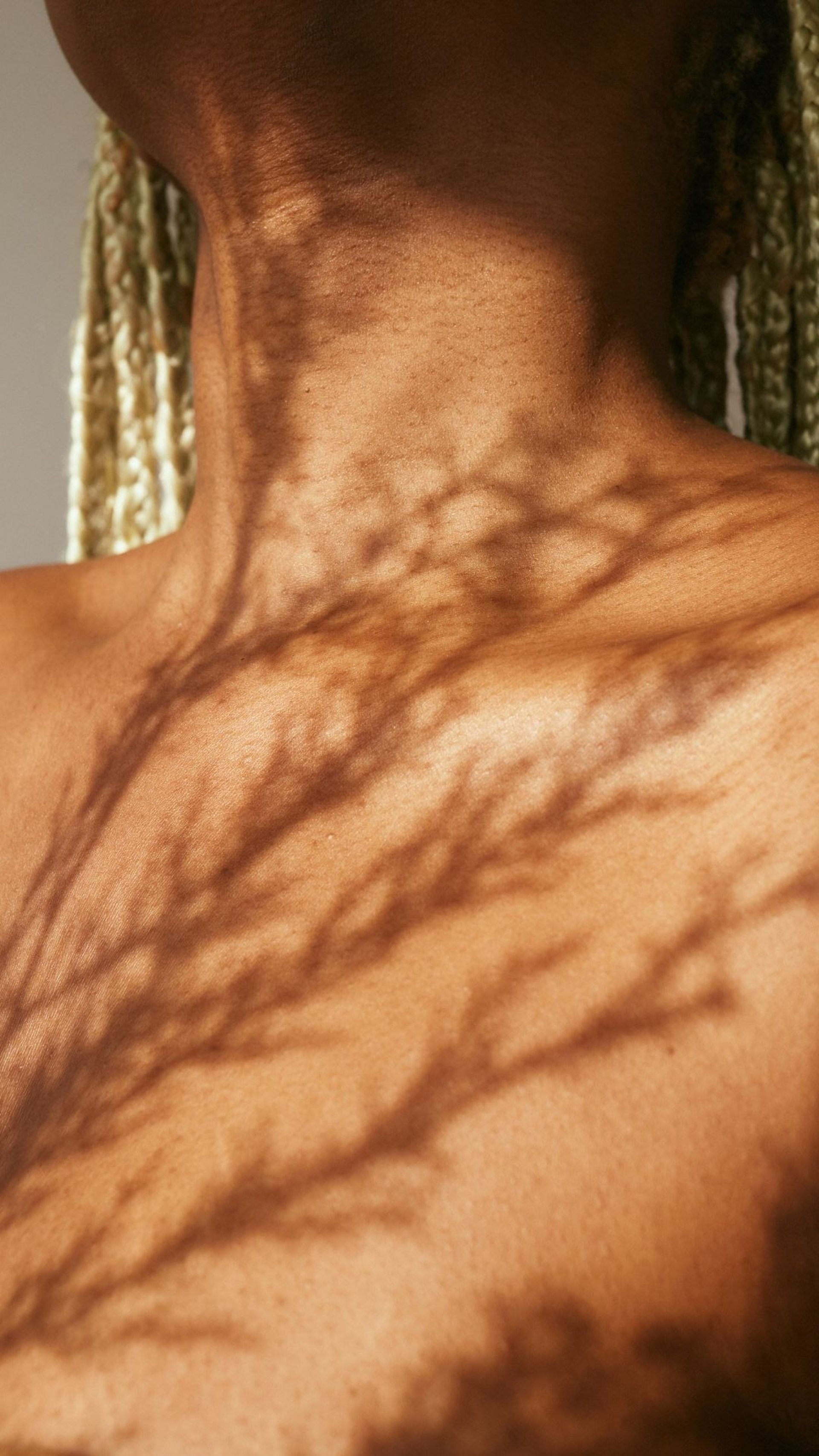 topless woman with brown hair