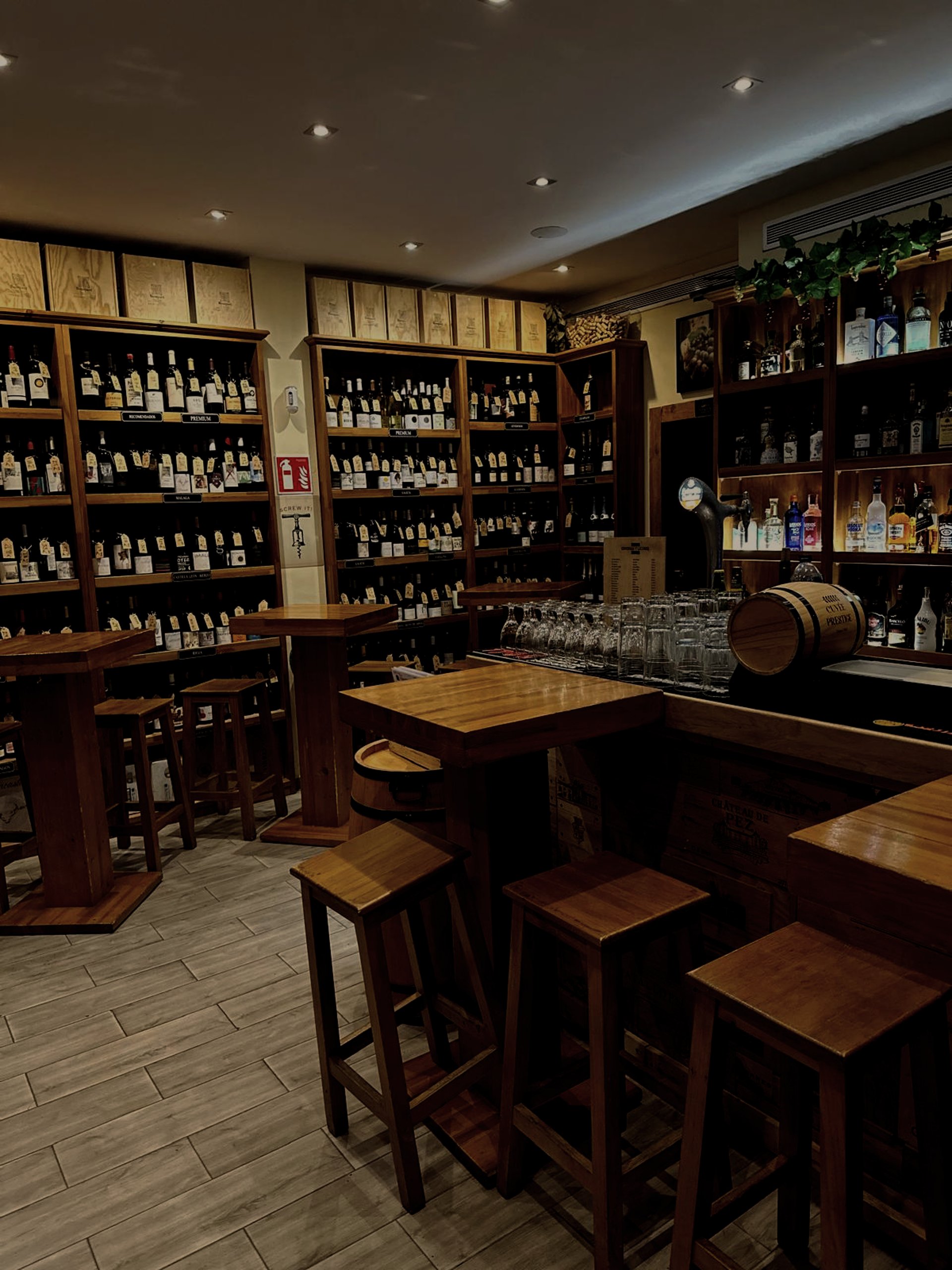 brown wooden shelf with bottles