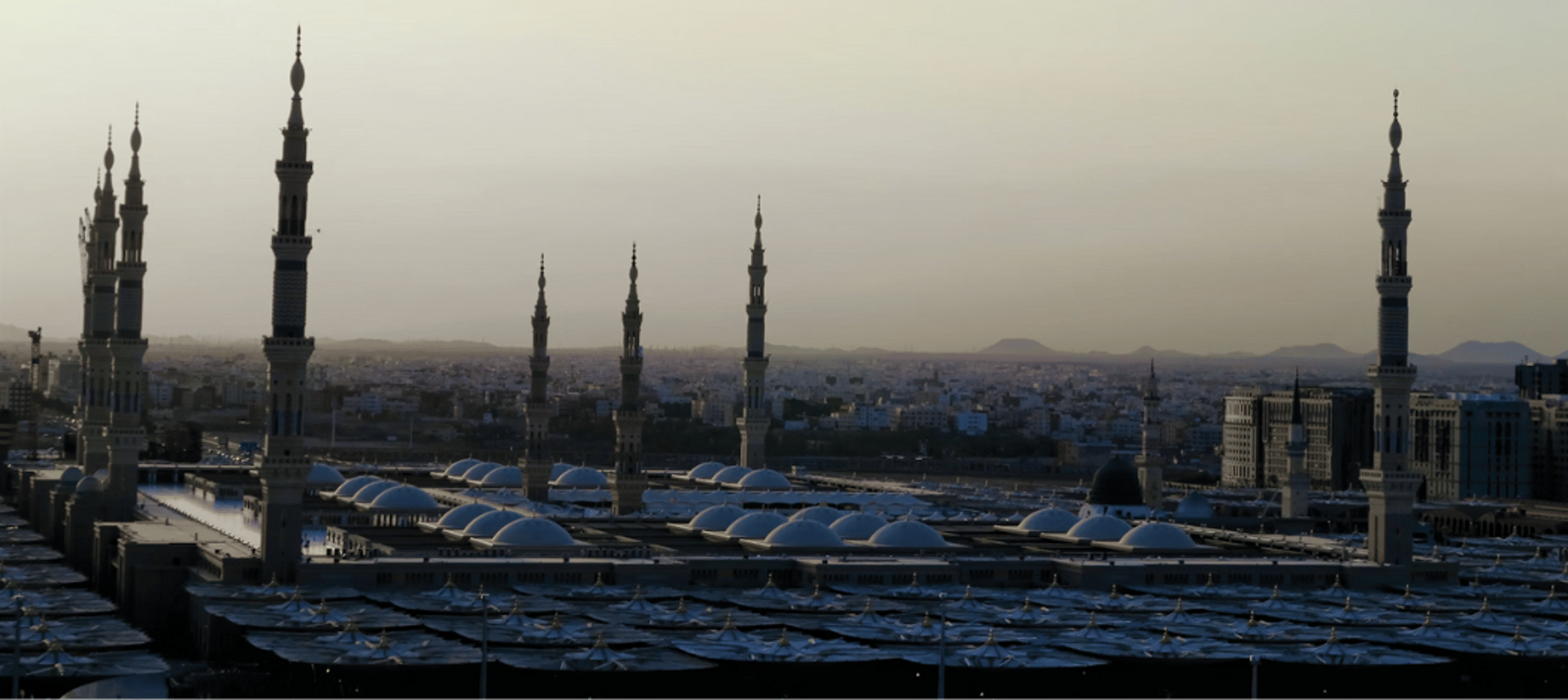 a view of a city with tall buildings