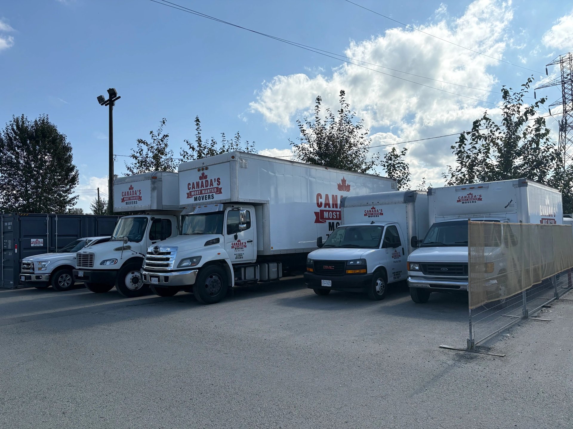 Canada’s Most Wanted Movers fleet lined up in a secure Port Coquitlam lot before dispatch.