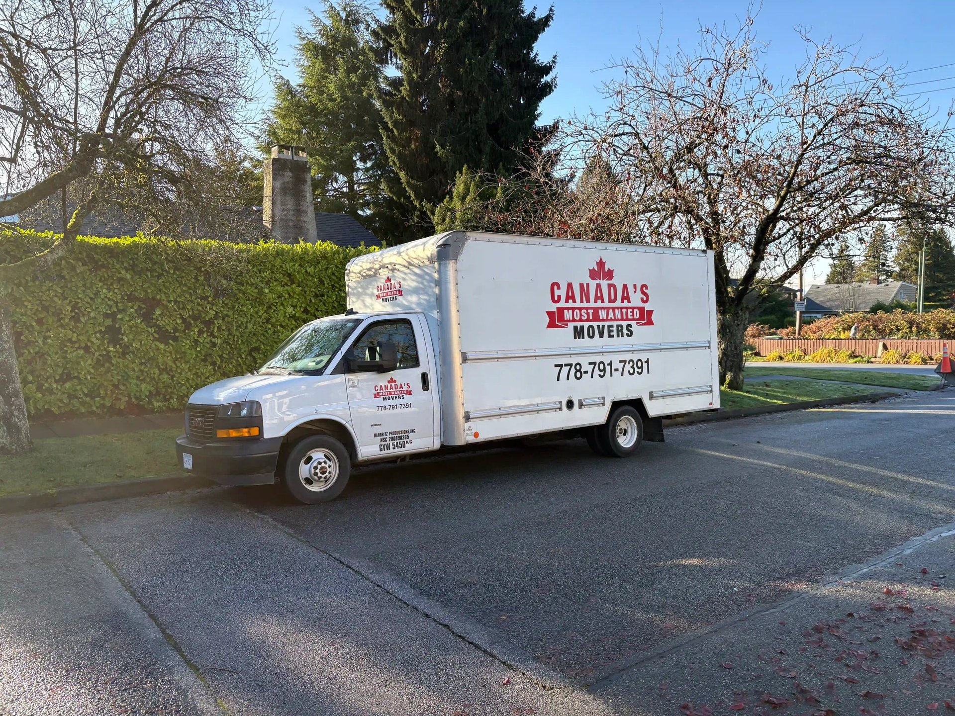 Canada’s Most Wanted Movers truck parked beside a construction project in Surrey, ready for a commercial move.