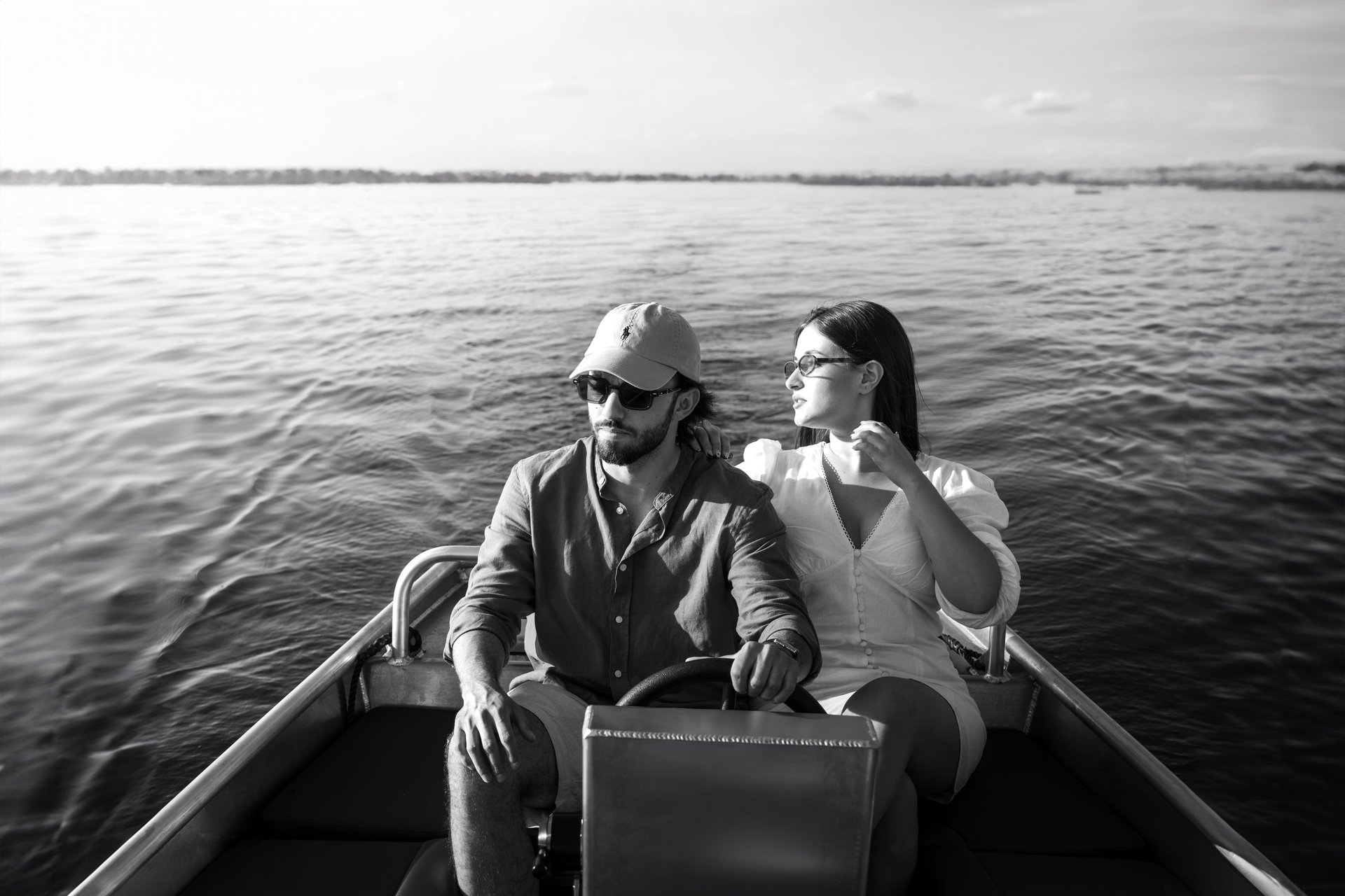 an abstract photo of a curved building with a blue sky in the background