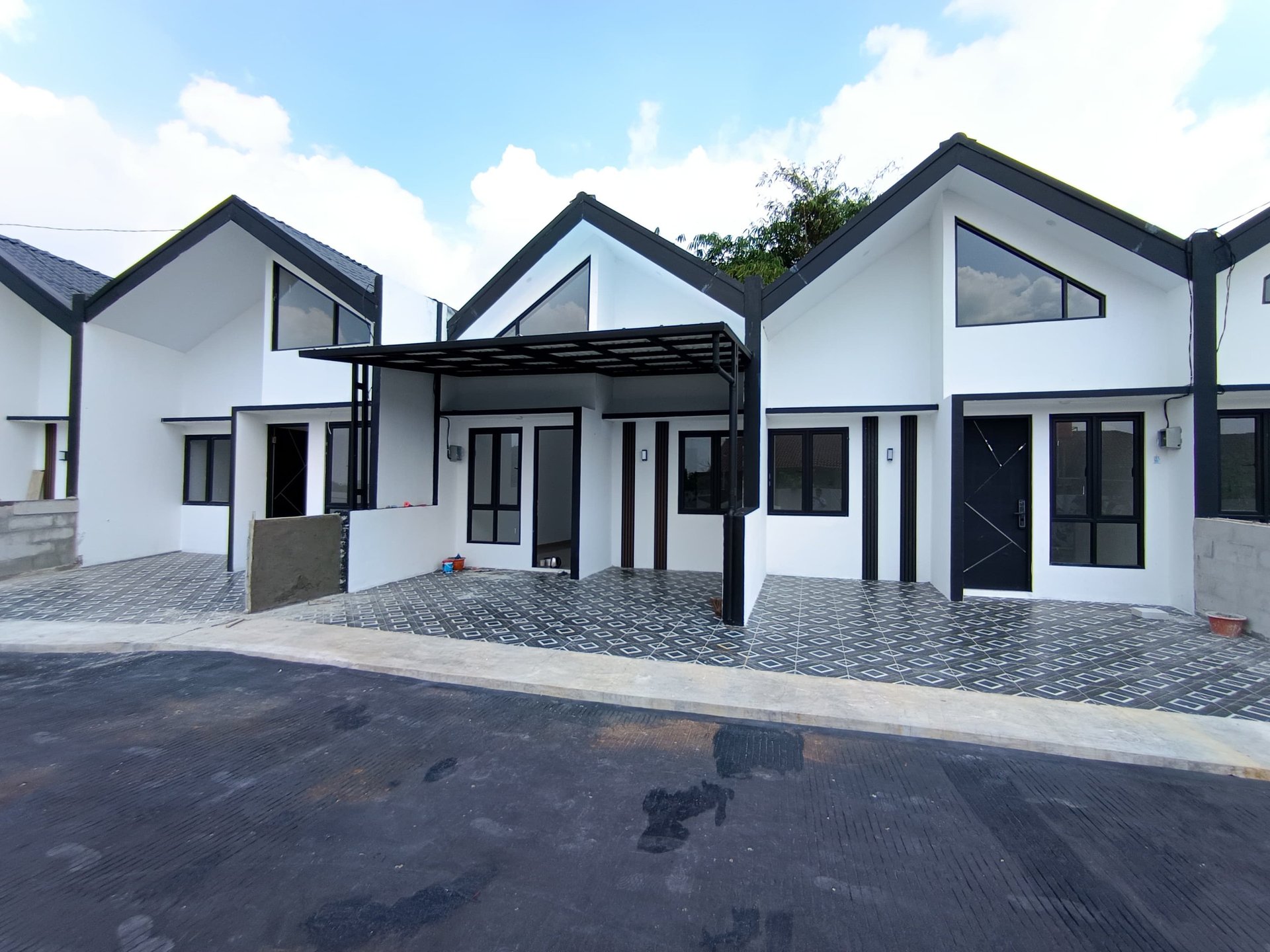 black and brown leather padded tub sofa
