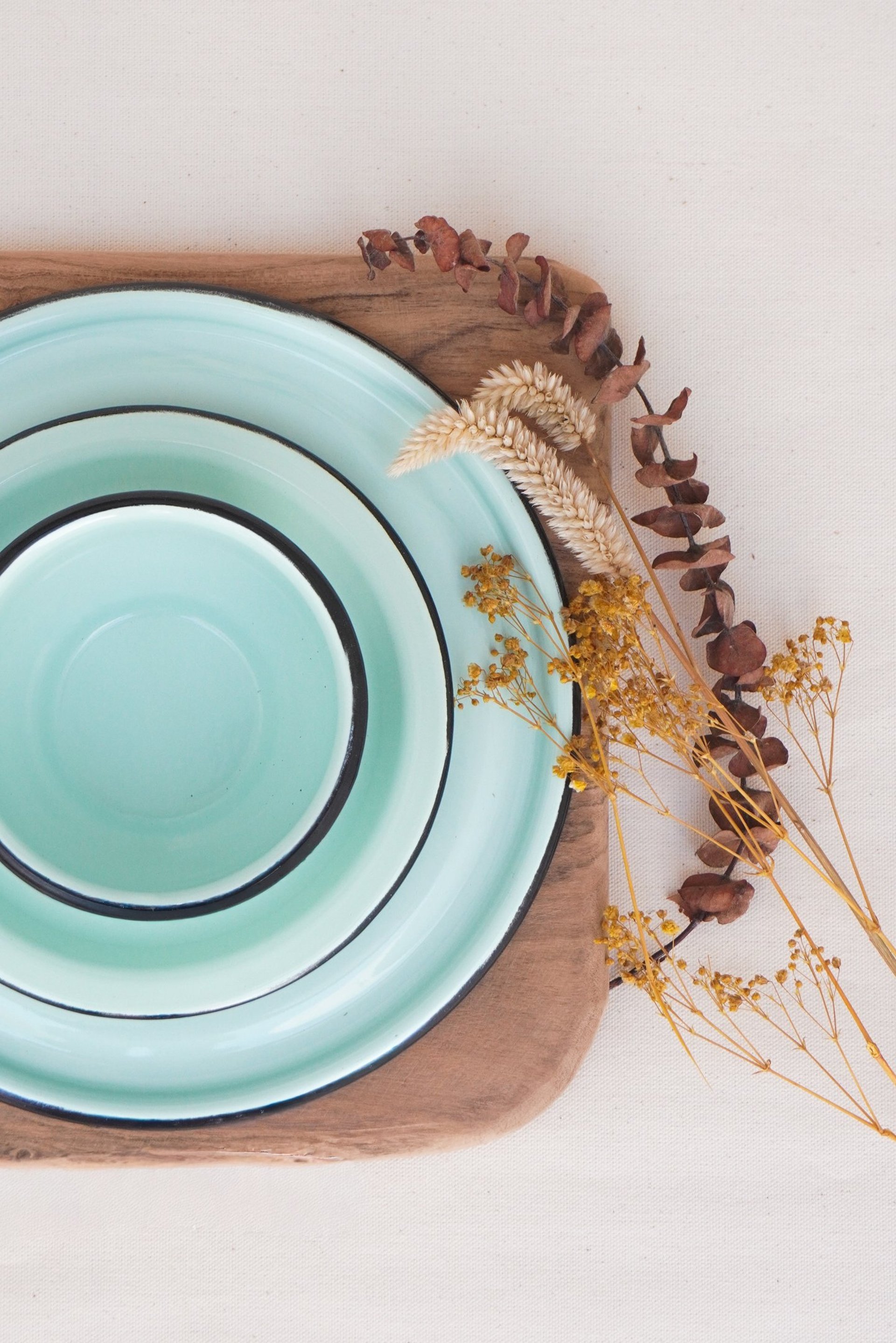 woman wearing yellow long-sleeved dress under white clouds and blue sky during daytime