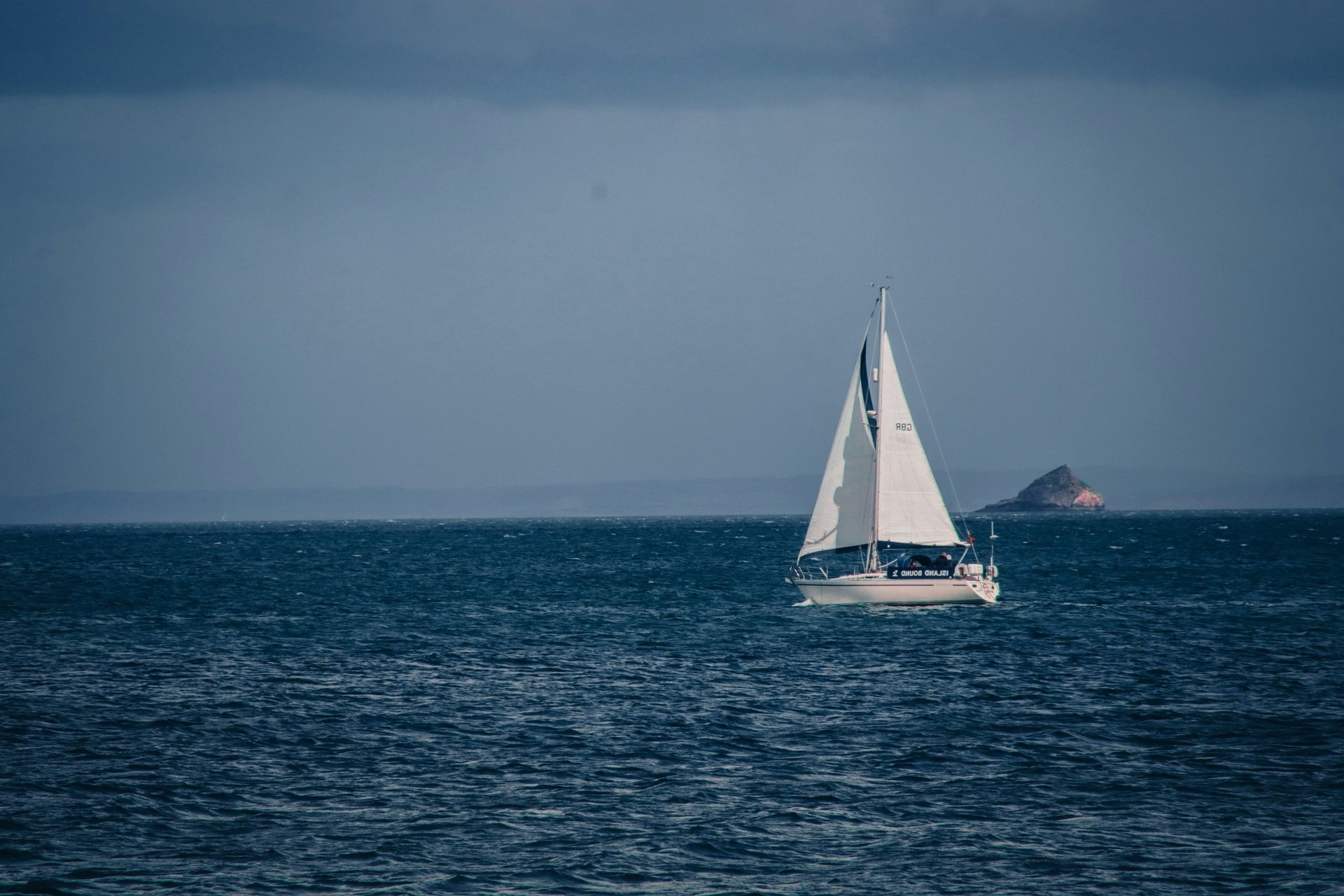 a boat in the middle of a body of water