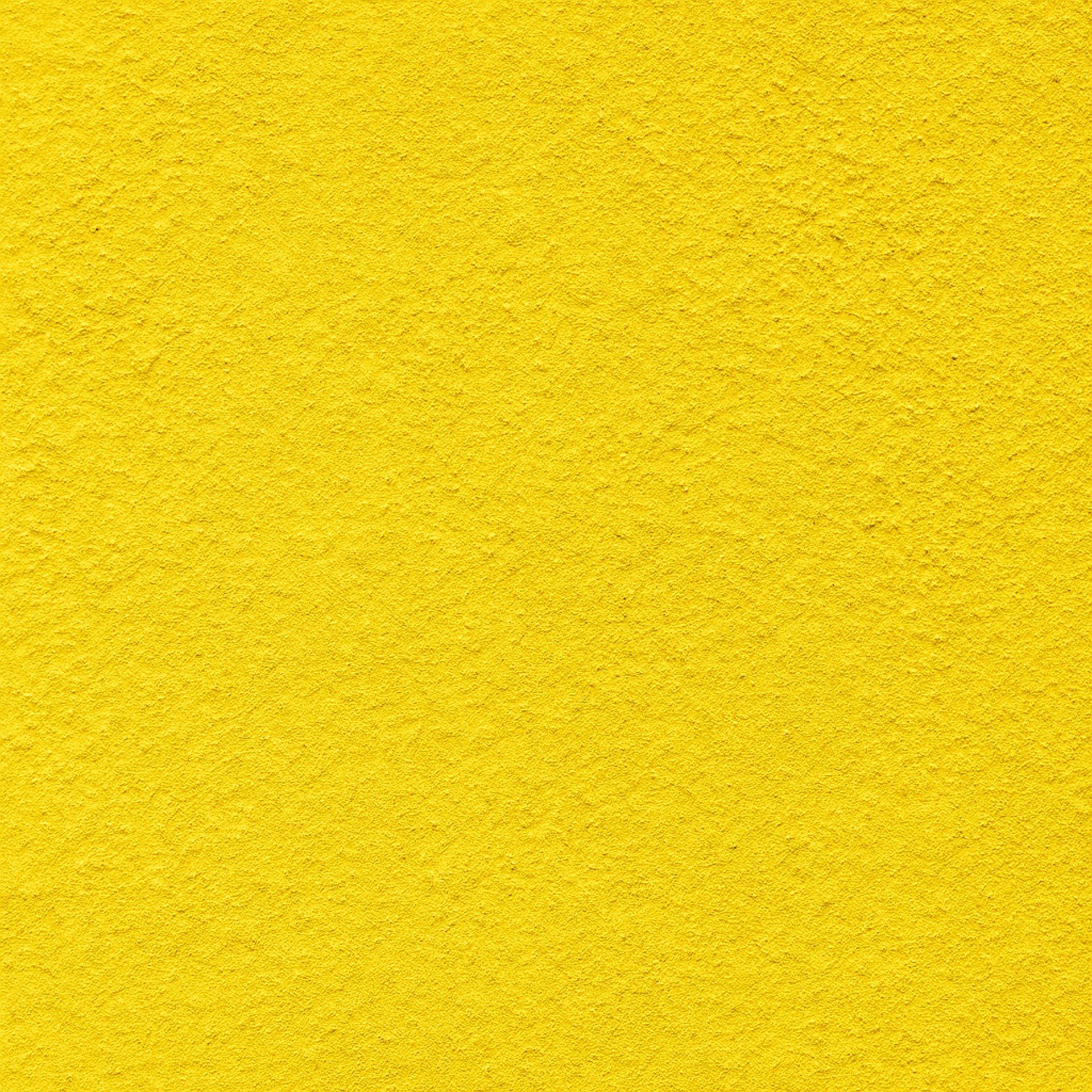 Scattered sheets of white paper covering the entire frame