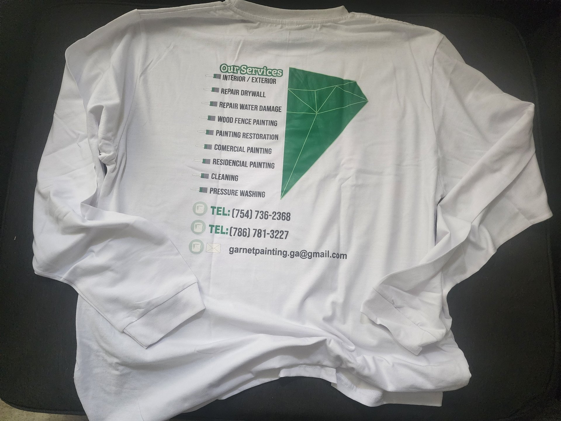 Team uniform showing Garnet Painting & Remodeling GA services and contact information.
