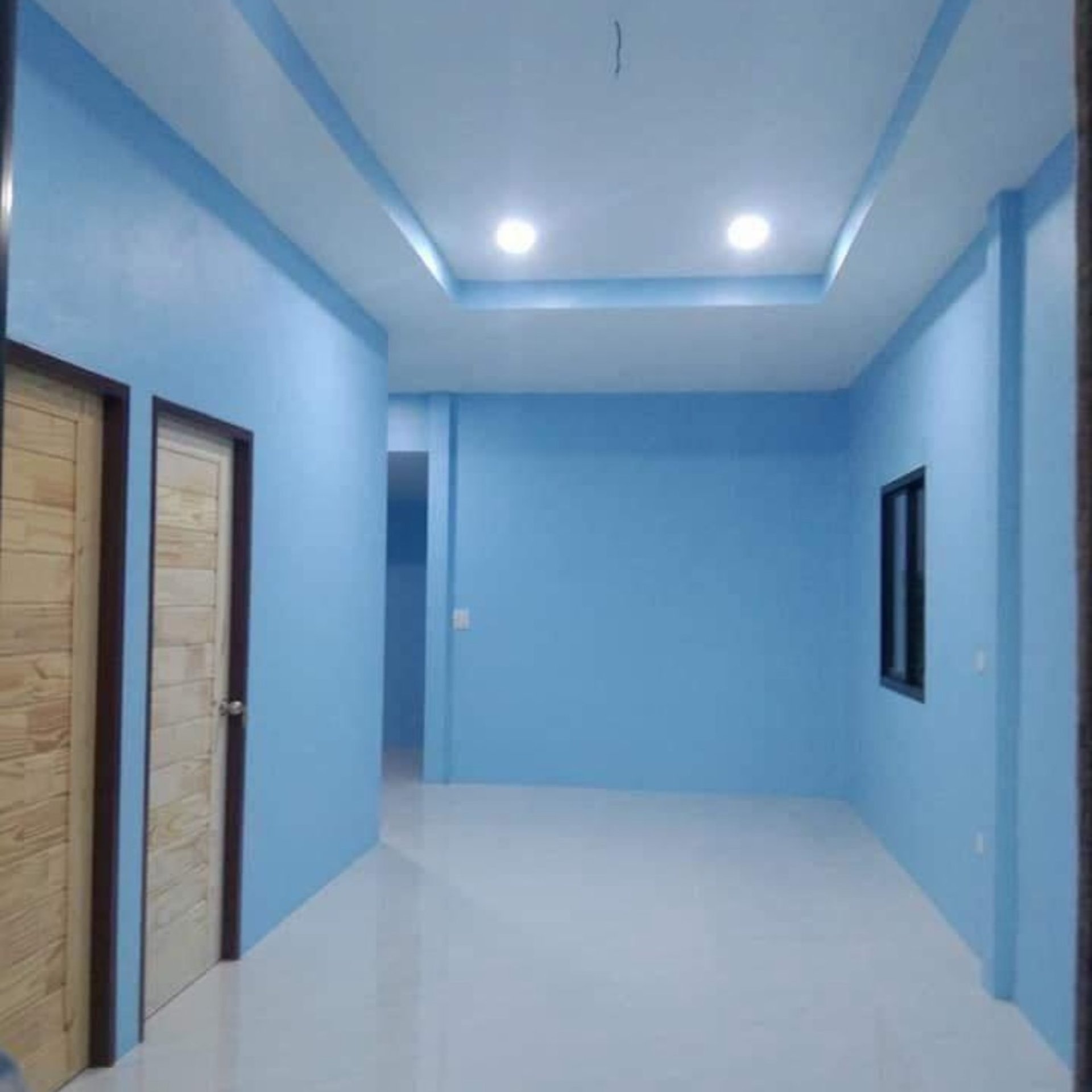 Finished hallway with painted walls and drywall ceiling with recessed lighting by Garnet Painting & Remodeling GA