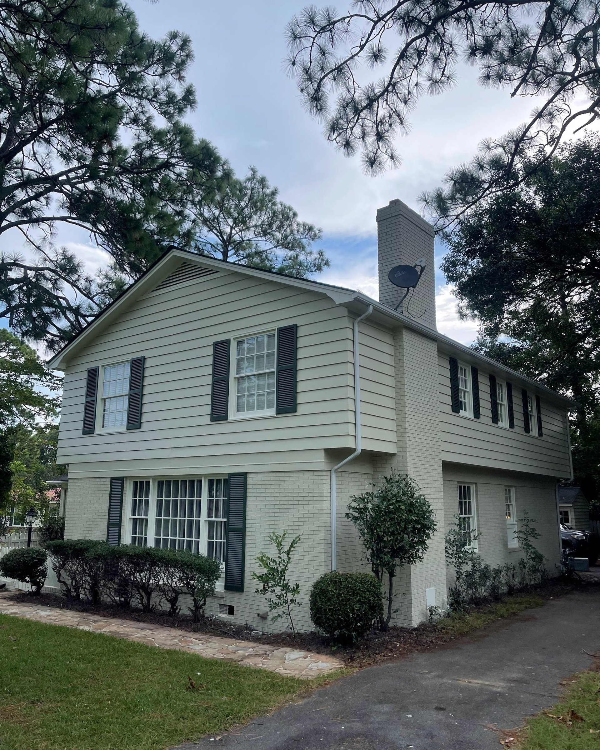 esidential exterior house painting project completed by Garnet Painting & Remodeling in Douglas, GA.