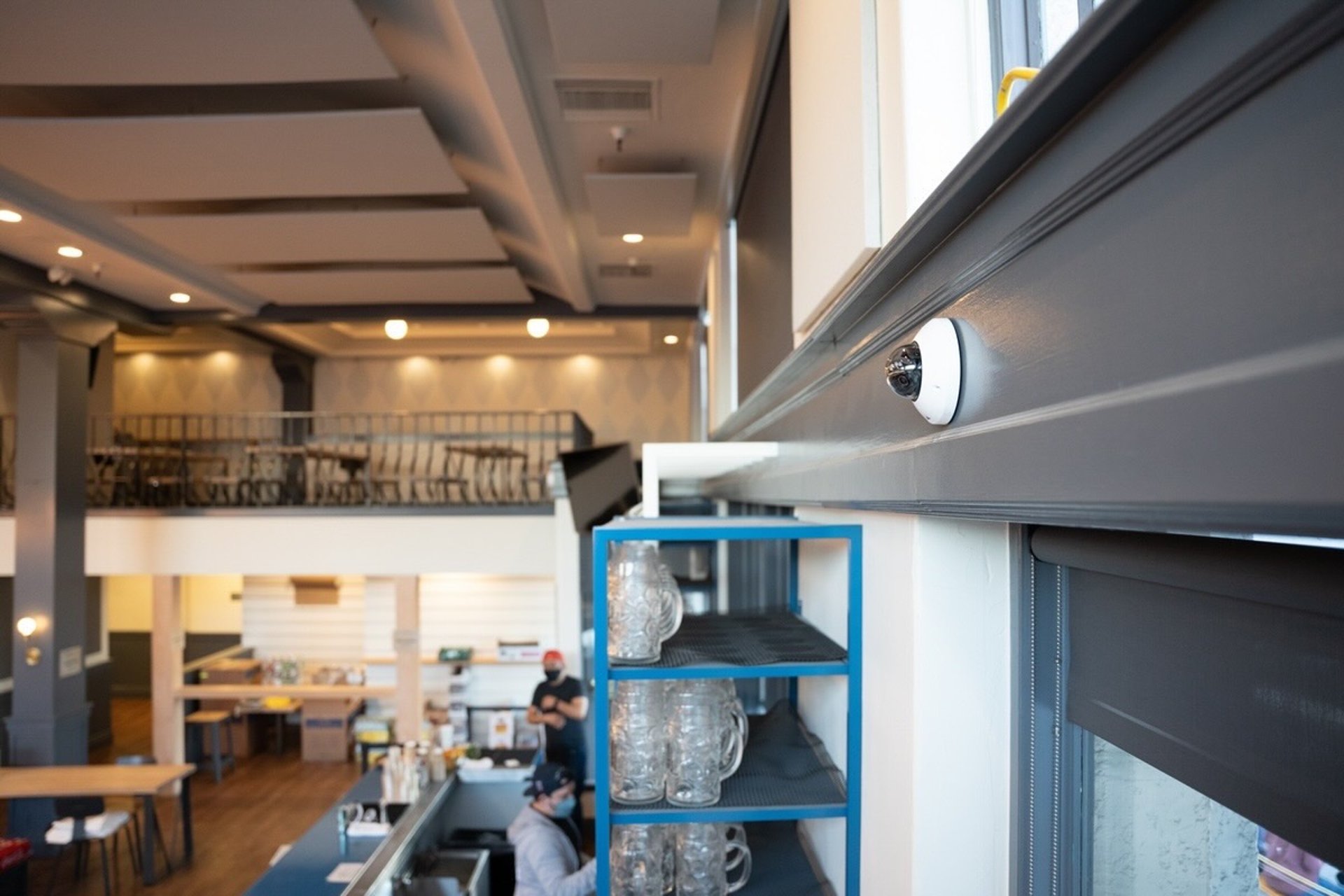 Cloud-Based Surveillance Camera Installed on Wall in Restaurant