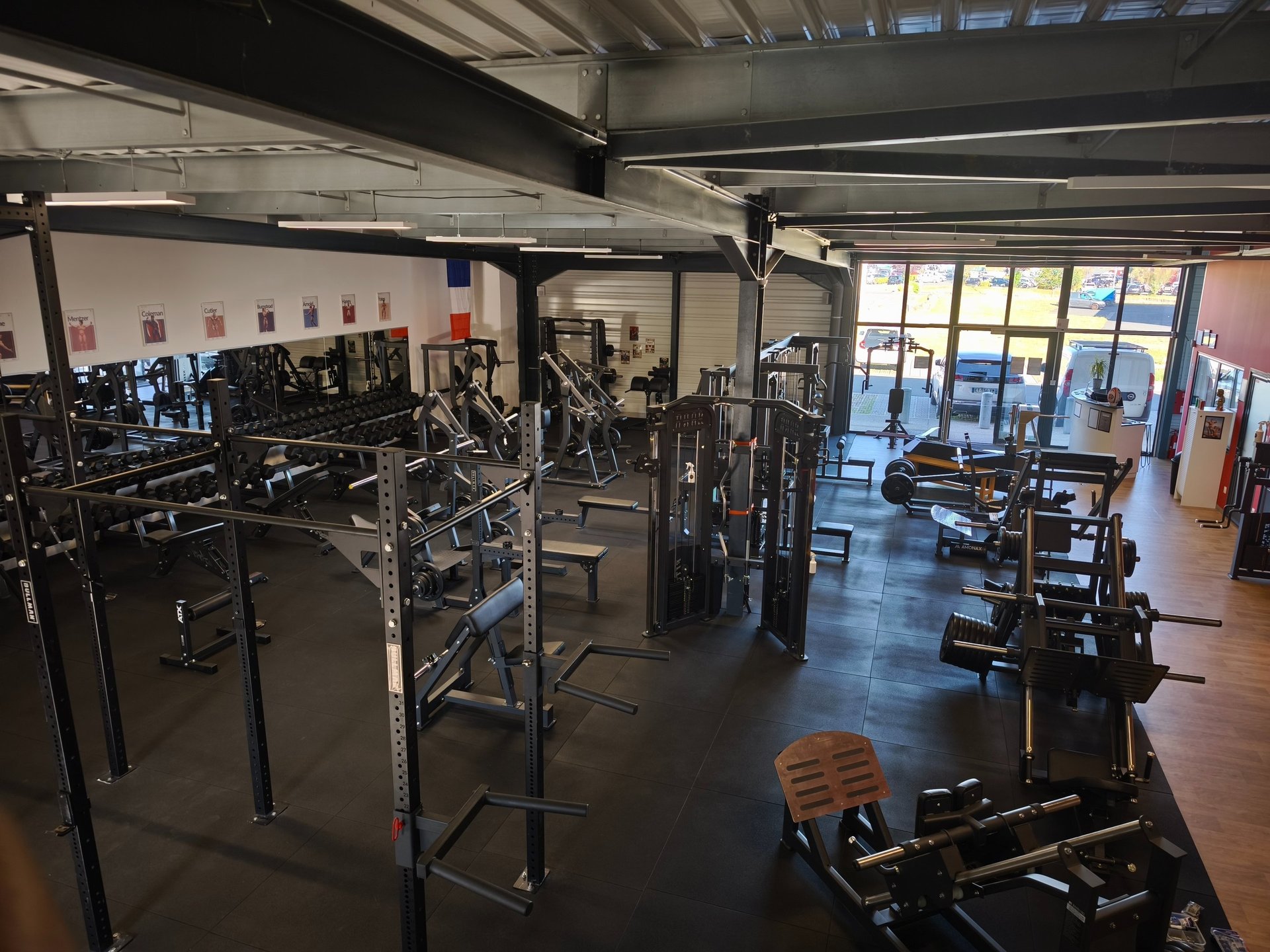 black barbell on tile flooring