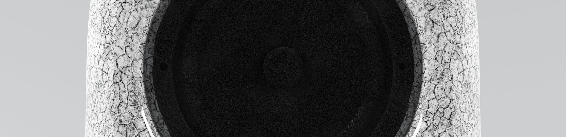 an abstract photo of a curved building with a blue sky in the background