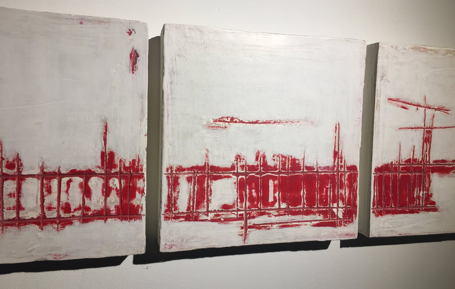 person wearing grey knit sweater