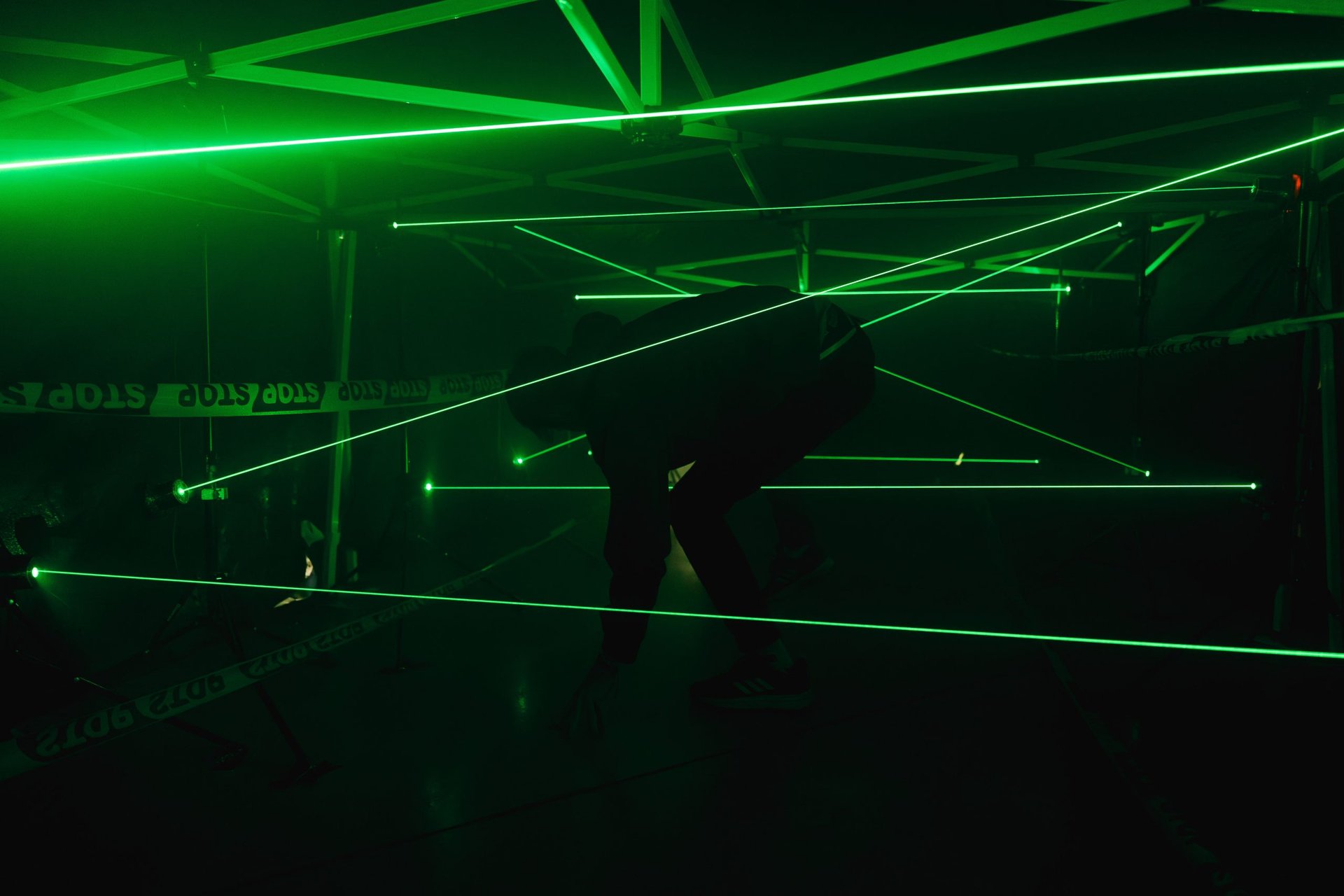 an abstract photo of a curved building with a blue sky in the background