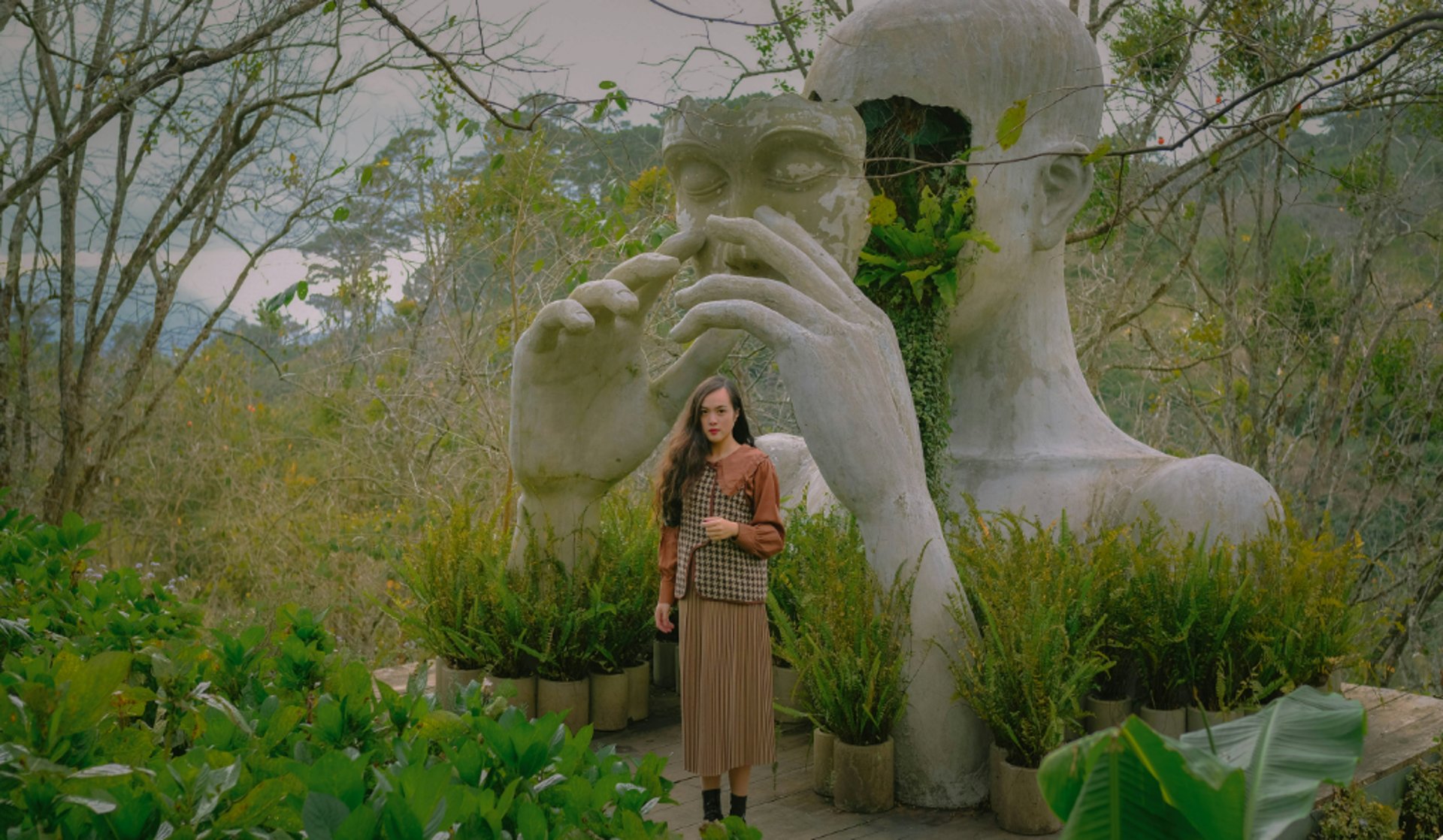 a close up of a black and brown abstract painting