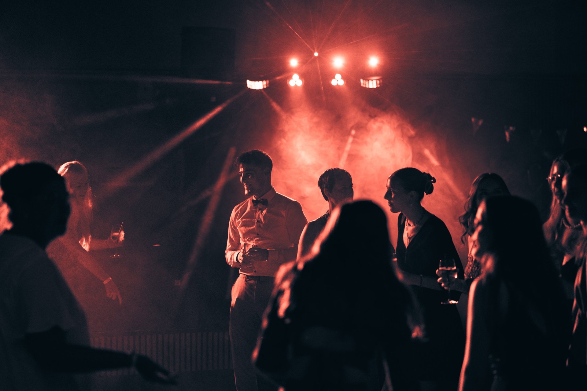 an abstract photo of a curved building with a blue sky in the background