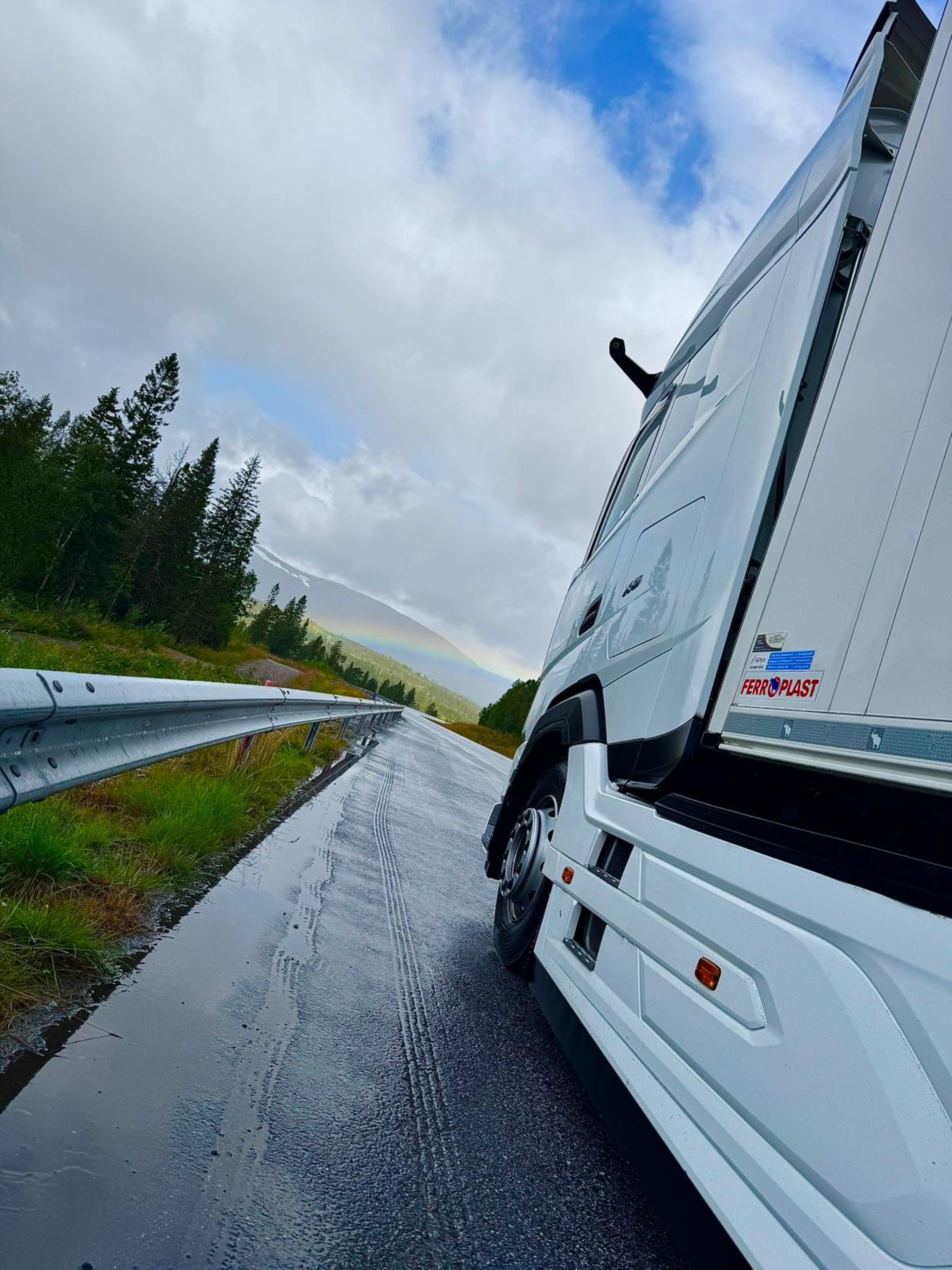 woman wearing yellow long-sleeved dress under white clouds and blue sky during daytime