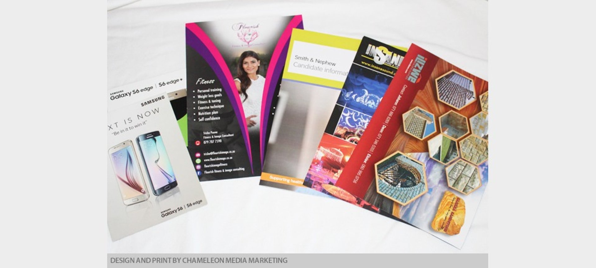 an abstract photo of a curved building with a blue sky in the background