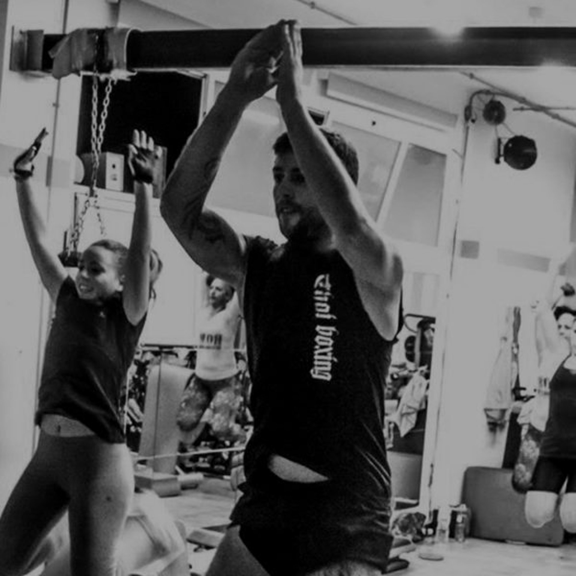 black and brown leather padded tub sofa