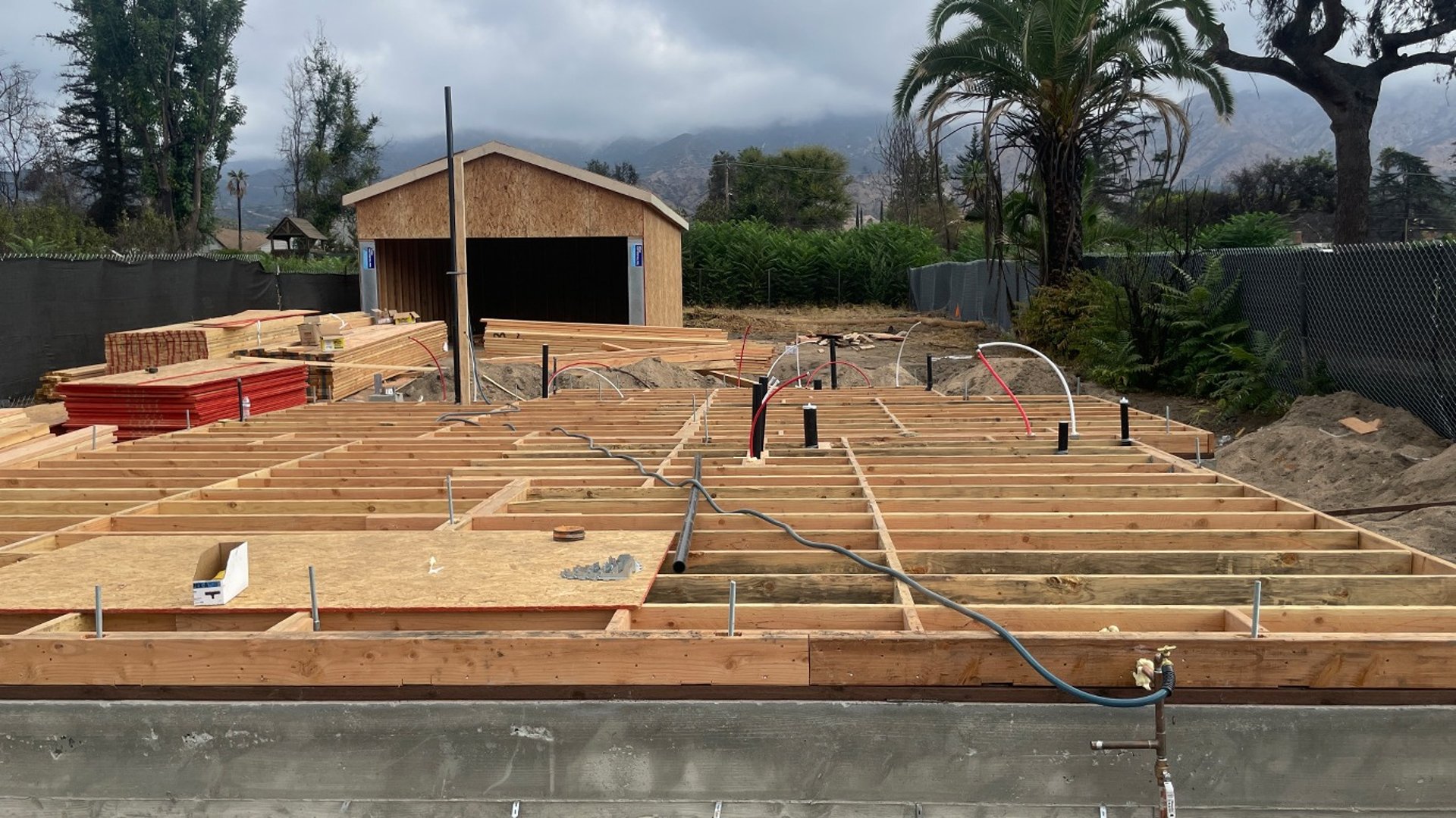 an abstract photo of a curved building with a blue sky in the background