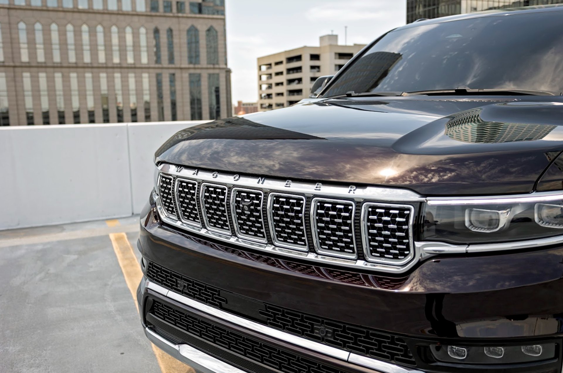 a red sports car parked in a parking lot