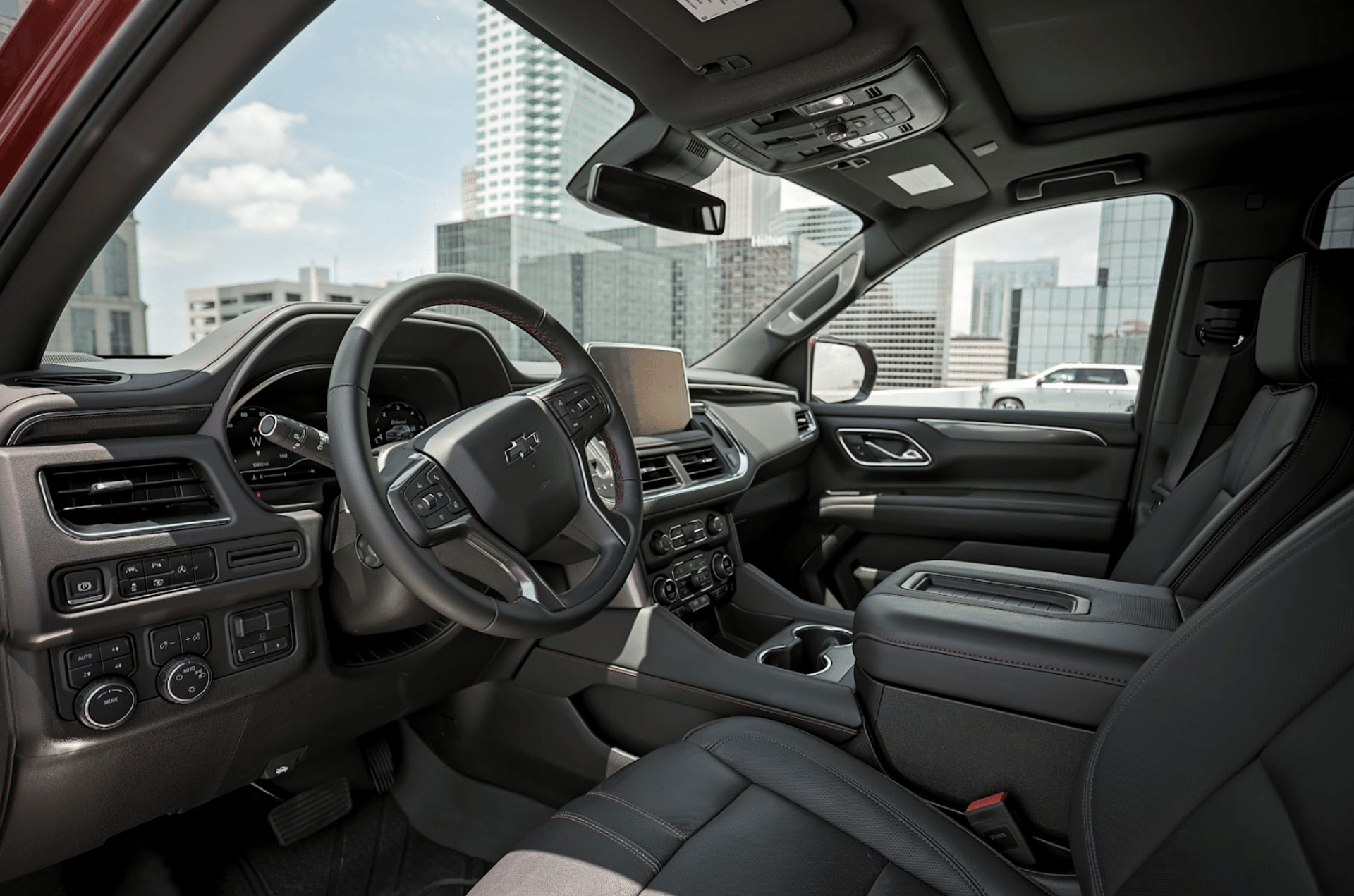 a close up of the hood of a red car