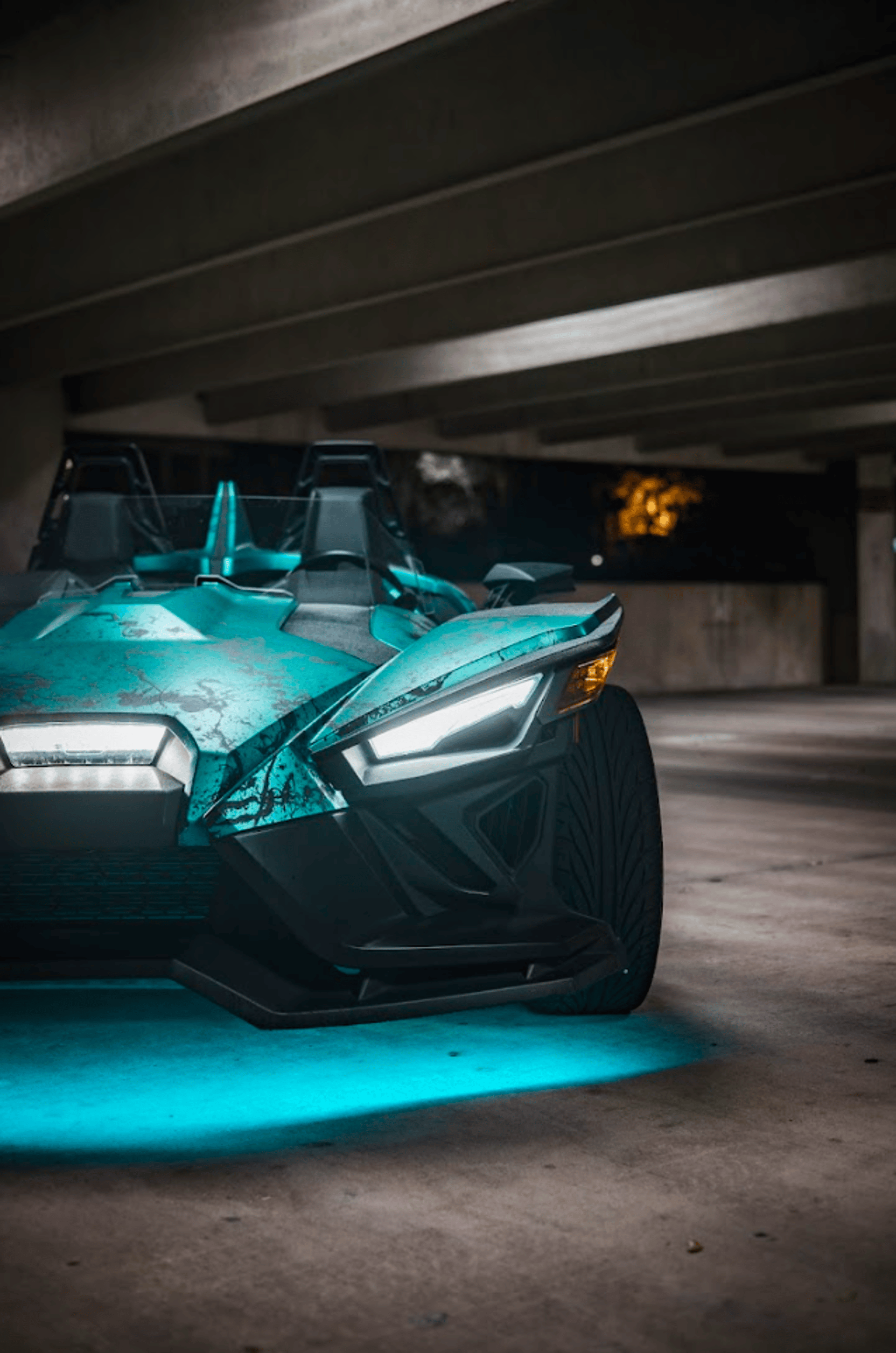 a red sports car parked in a parking lot