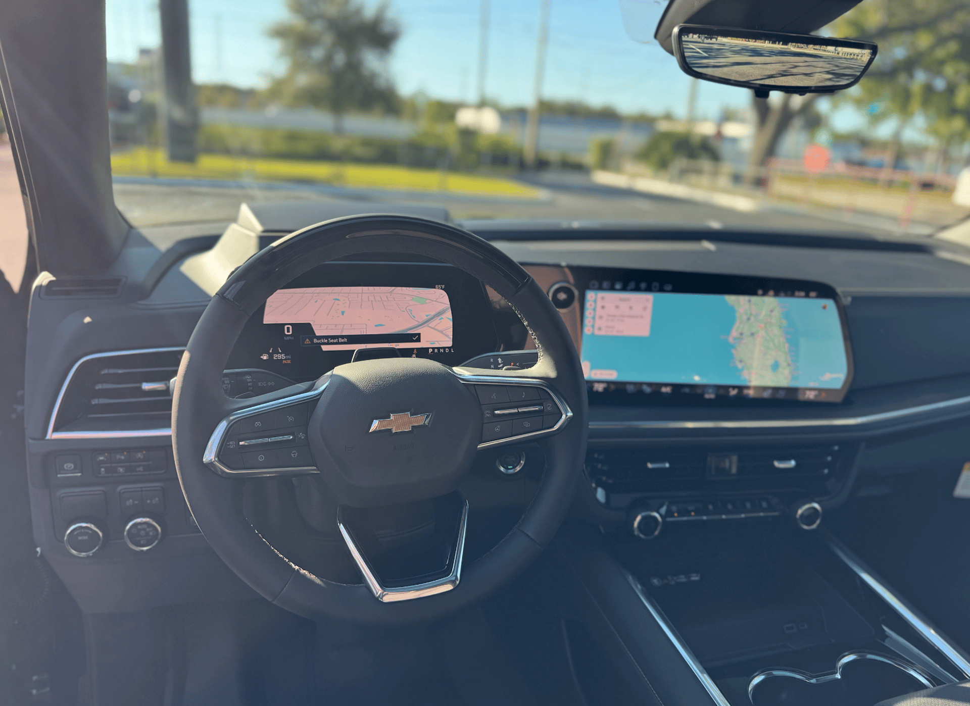 a close up of the hood of a red car