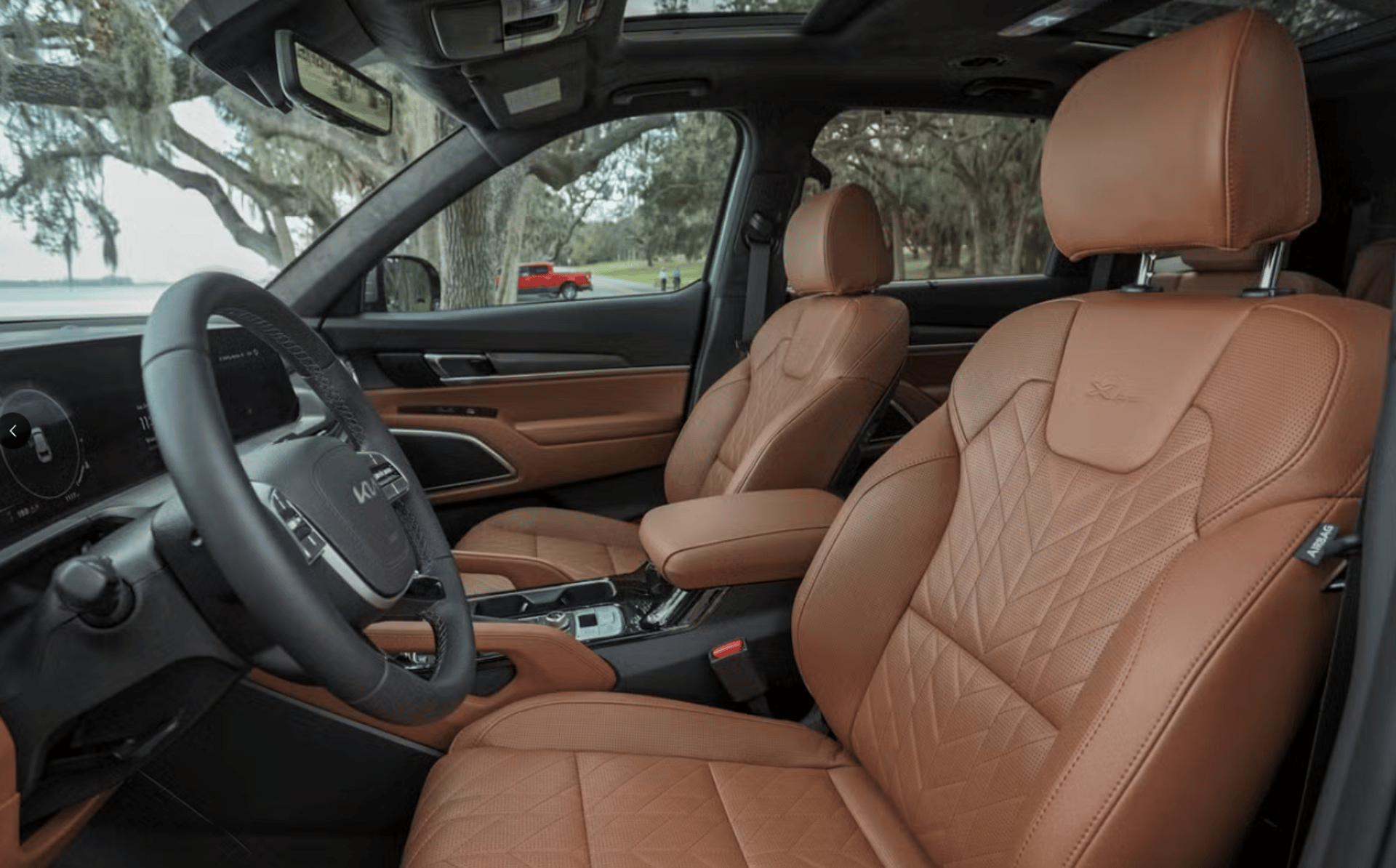 a close up of a steering wheel on a car